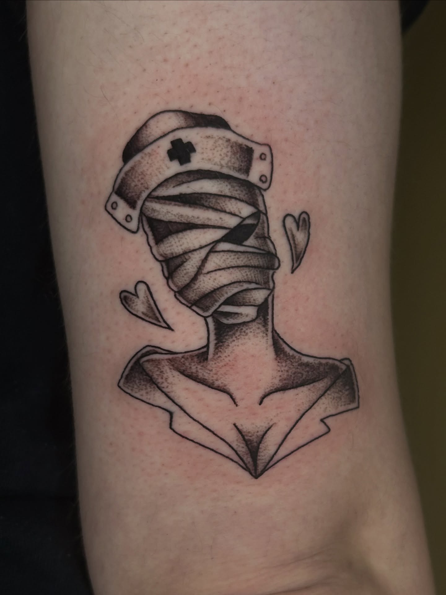 Nurse mummy dotwork tattoo on the forearm by Cassy D, Miami, Florida