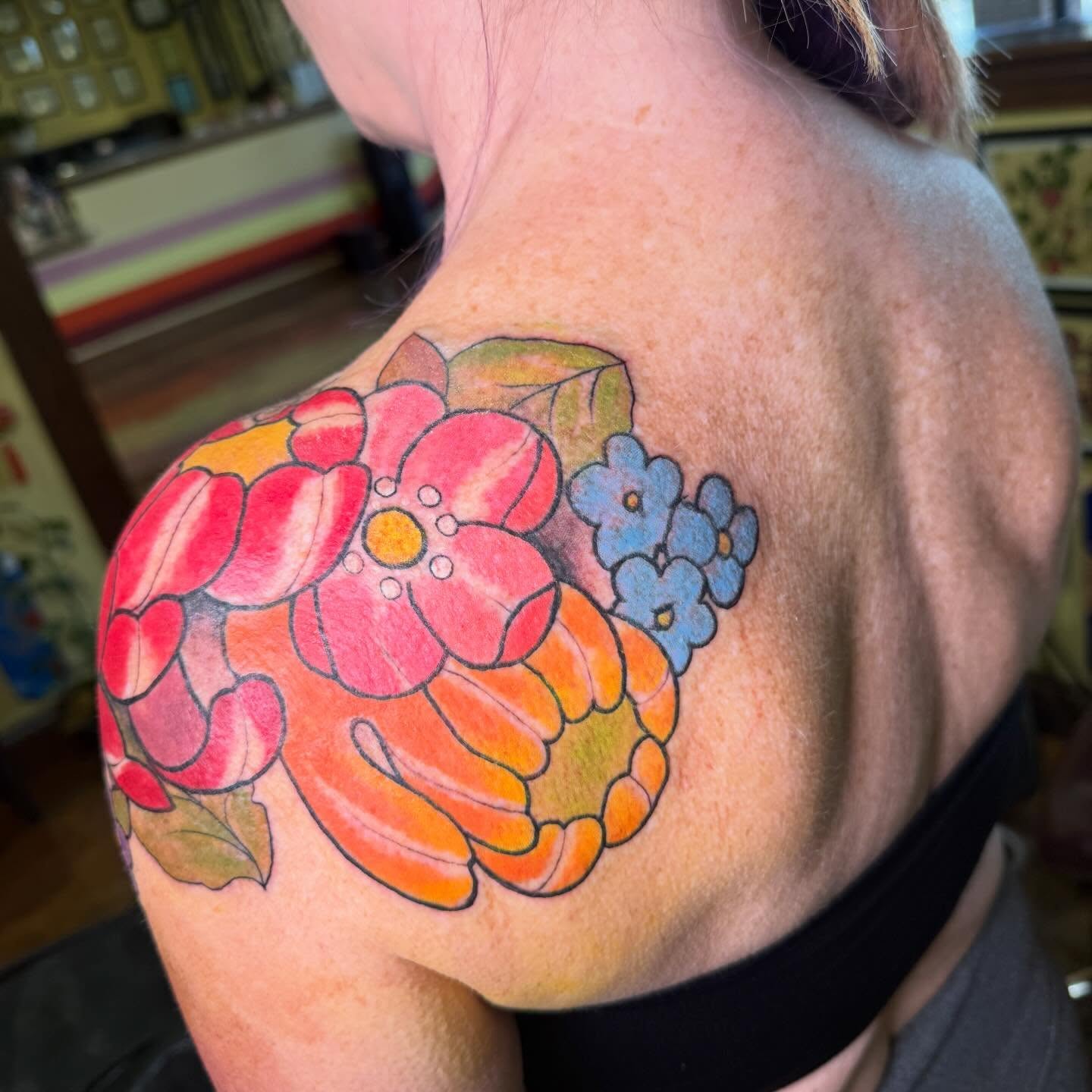 Floral bouquet dotwork tattoo on the shoulder by Erin McDavis