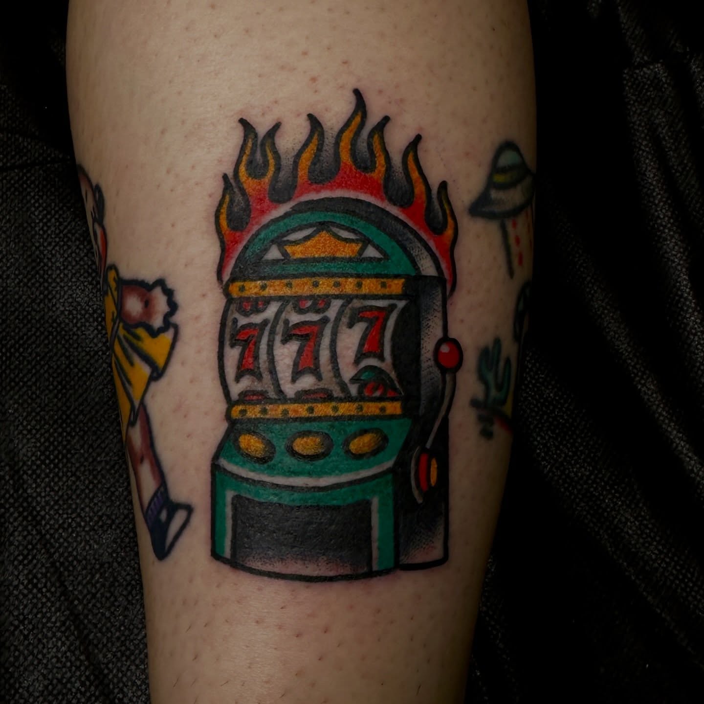 Slot machine American traditional tattoo on the forearm by ⛓️‍💥phillip Lee⛓️‍💥