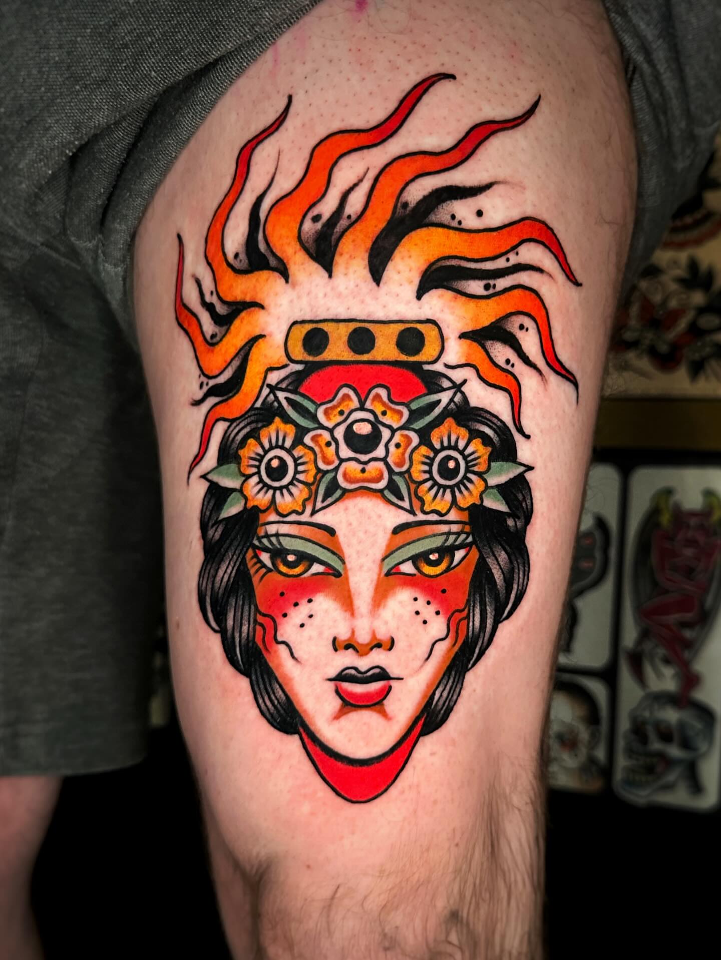 Woman with floral crown American traditional tattoo on the thigh by Alex Finnerty, Reading, Massachusetts