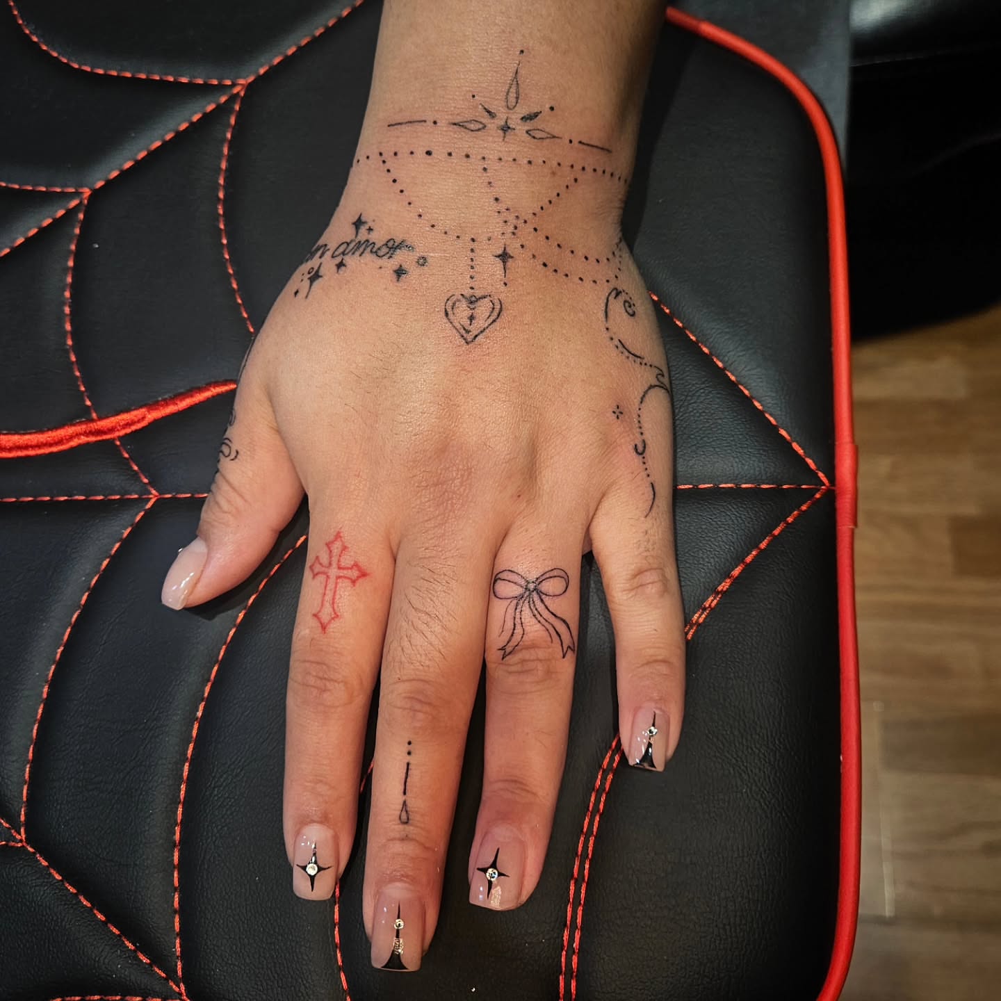 Geometric design dotwork tattoo on the hand by Lee!