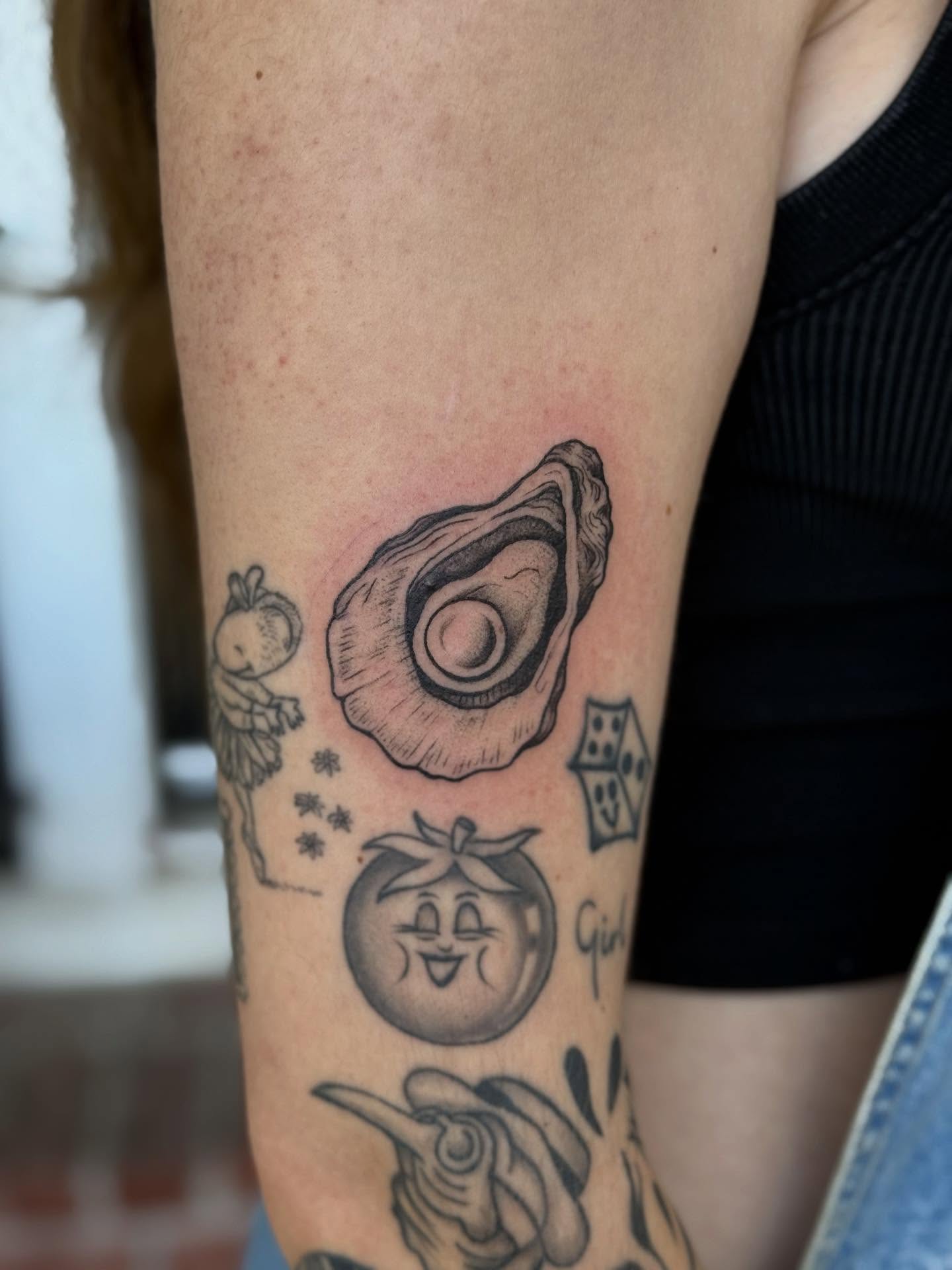 Oyster shell black and grey tattoo on the forearm by π½πππππ π½πππππππ, New Orleans, Louisiana