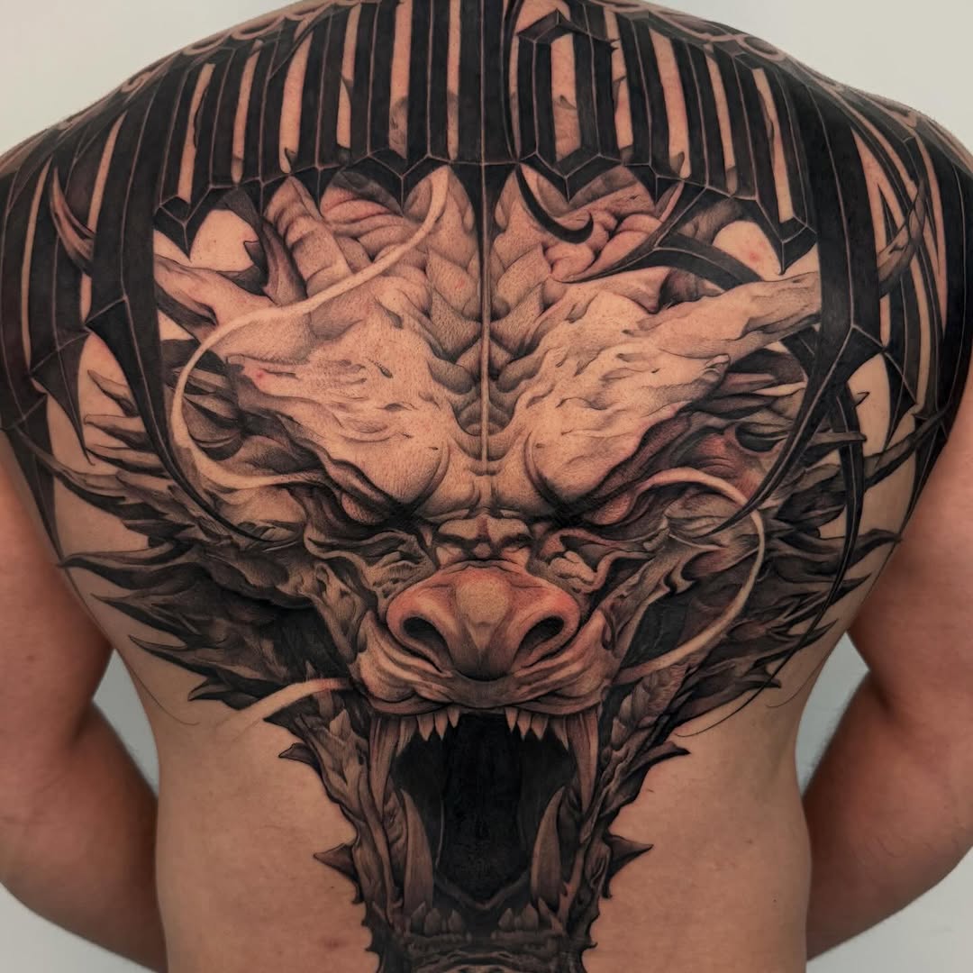 Tattoo by @dopeletterstattoo — realism, black_and_grey
