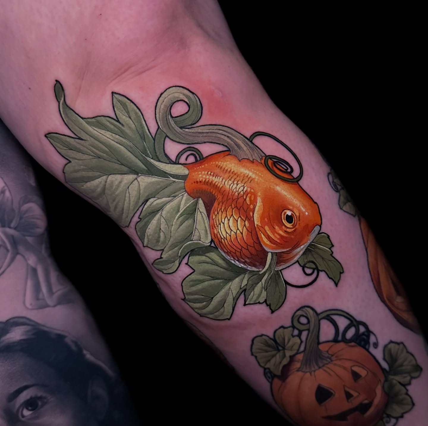 Goldfish realism tattoo on the forearm by Breah Beshore Kirk