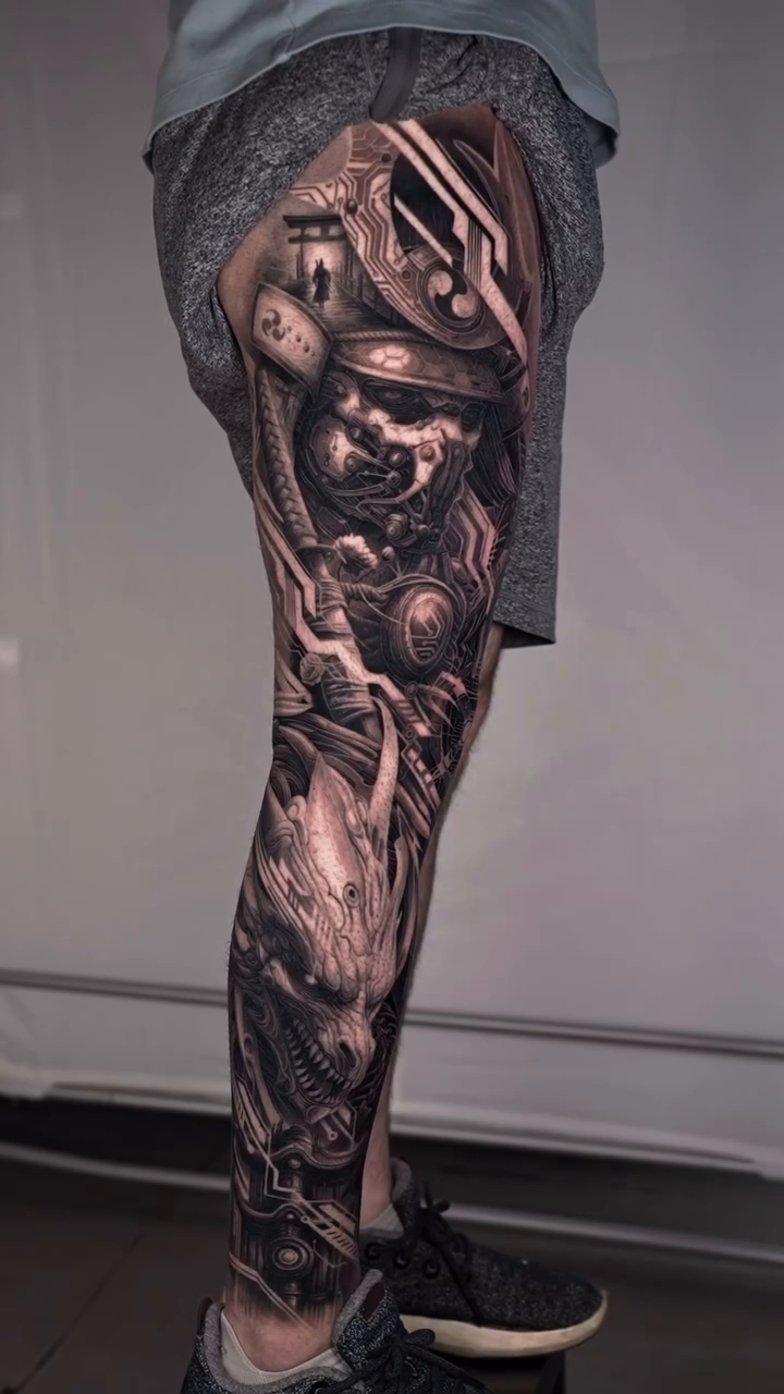 Samurai warrior and dragon Japanese tattoo on the calf by Sumok Kim