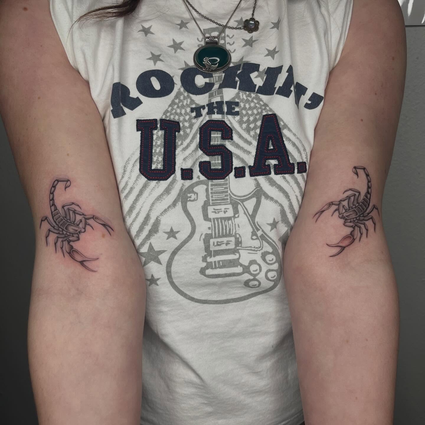 Scorpion black and grey tattoo on the forearm by Gabbie