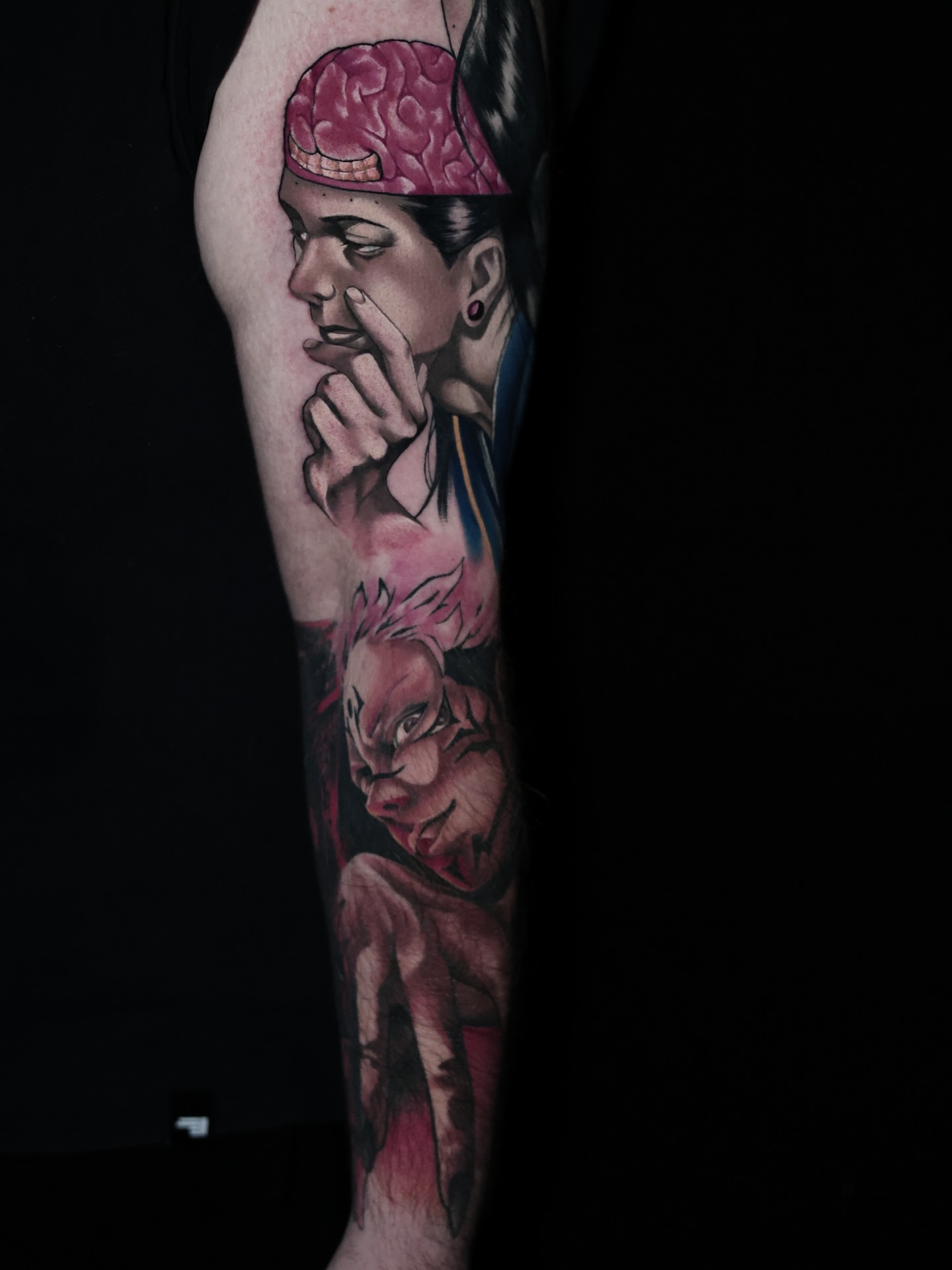 Brain and demon realism tattoo on the forearm by Morgan Martinez