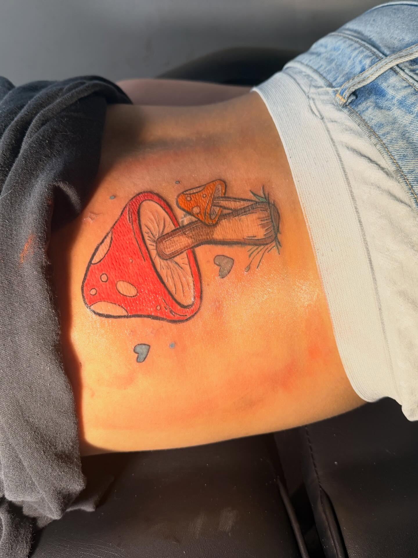 Mushroom dotwork tattoo on the torso by @bloodline__legacy