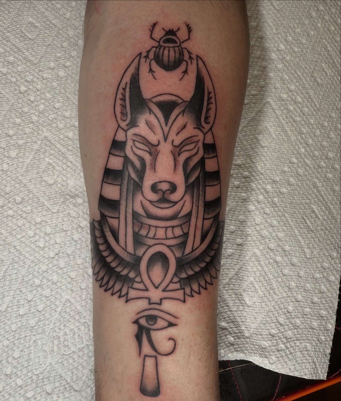 Ancient Egyptian deity geometric tattoo on the forearm by Kaysen