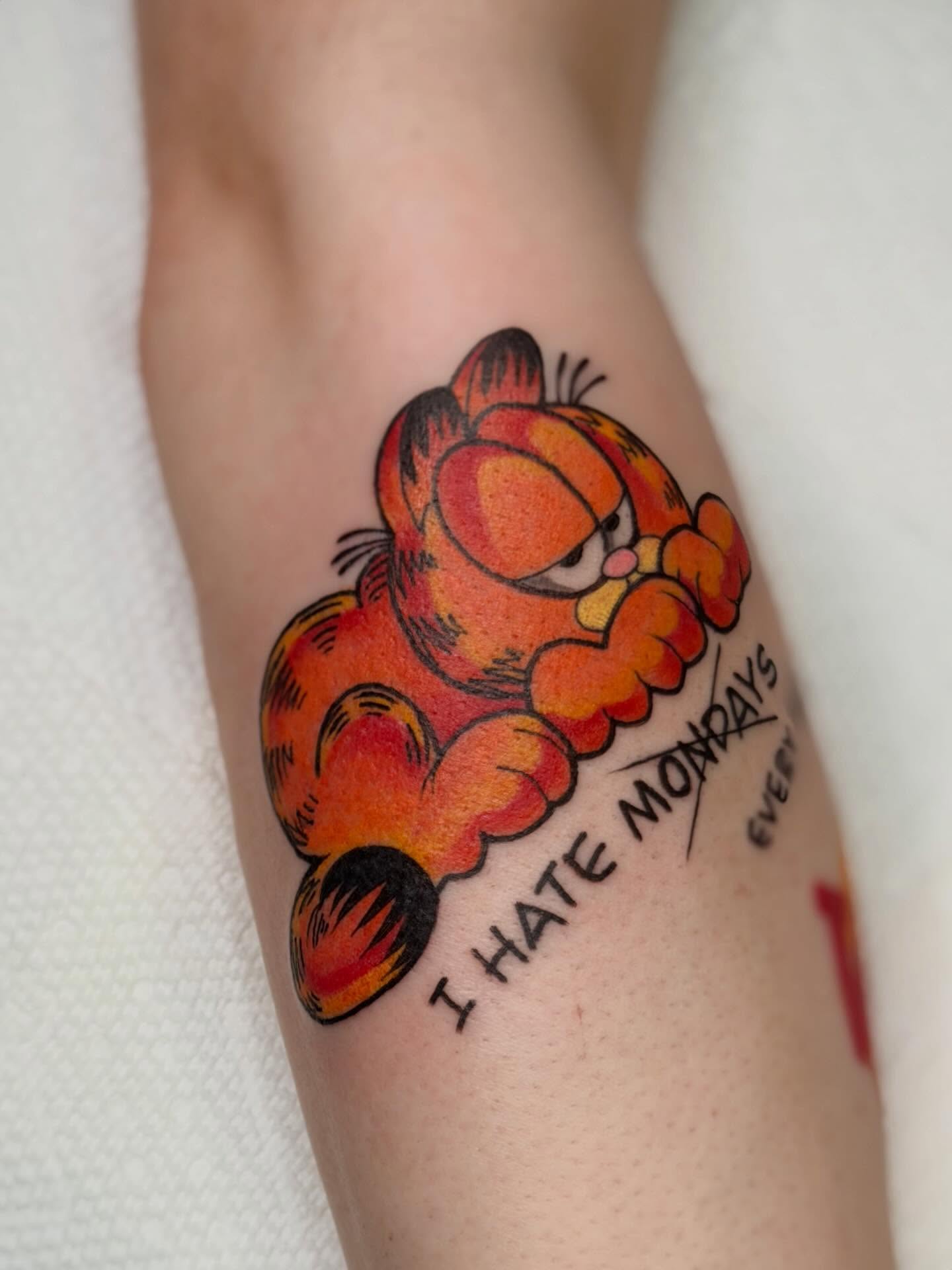 Garfield dotwork tattoo on the forearm by Constance Roberts