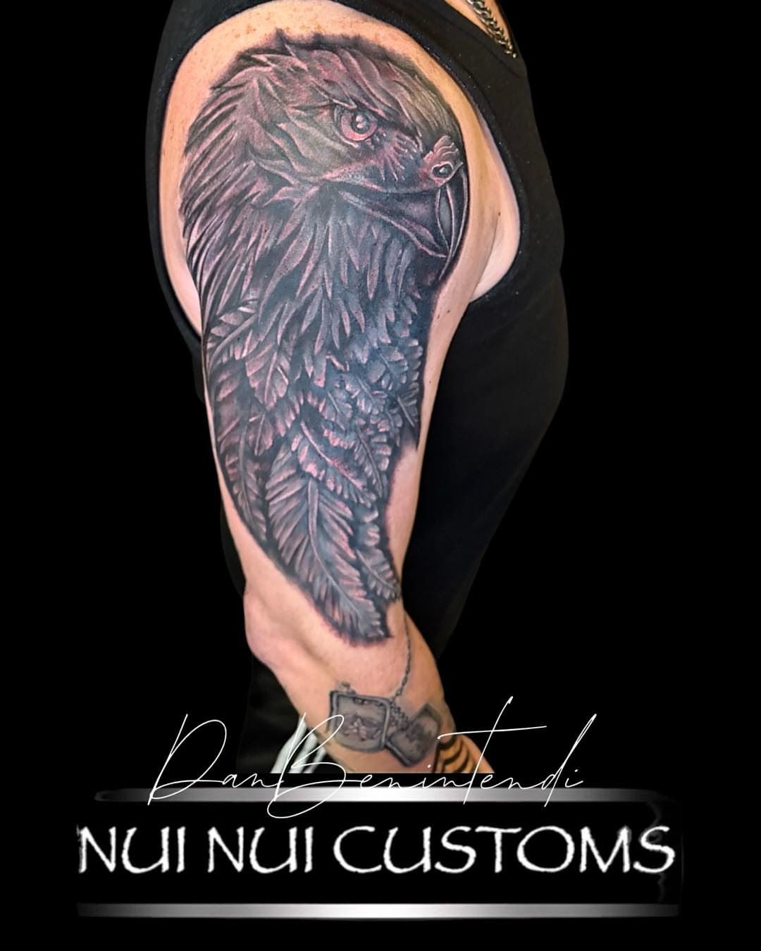 Hawk realism tattoo on the upper arm by Dan Benintendi l Polynesian Tattoo, Fort Worth, Texas