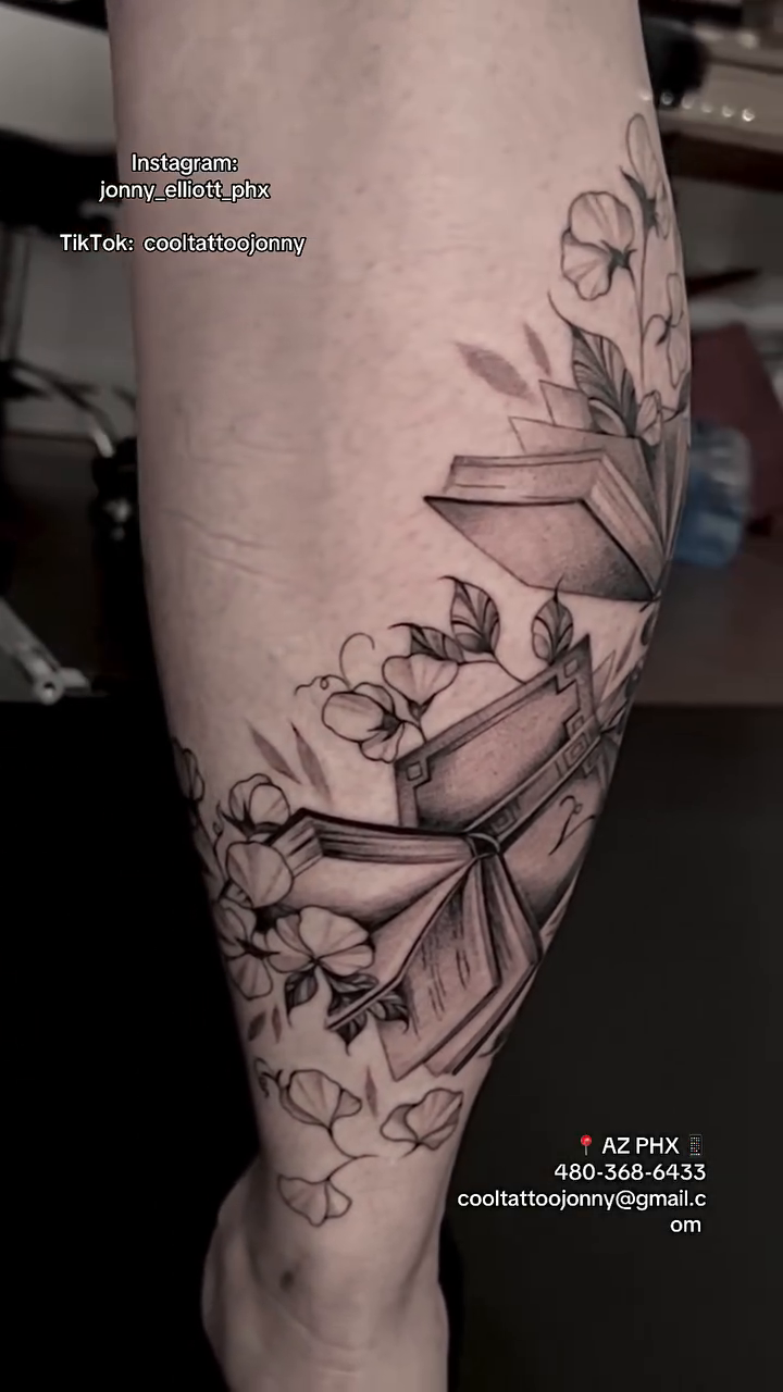 Open books with flowers realism tattoo by Jonny Tattoo PHX AZ
