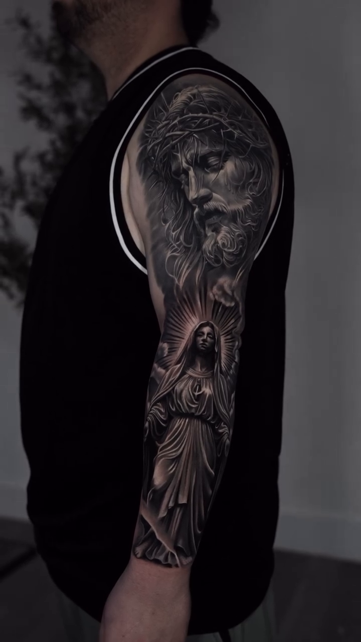 Jesus Christ and Mary Chicano tattoo on the forearm by Luis Manuel Olivera, North Miami, Florida