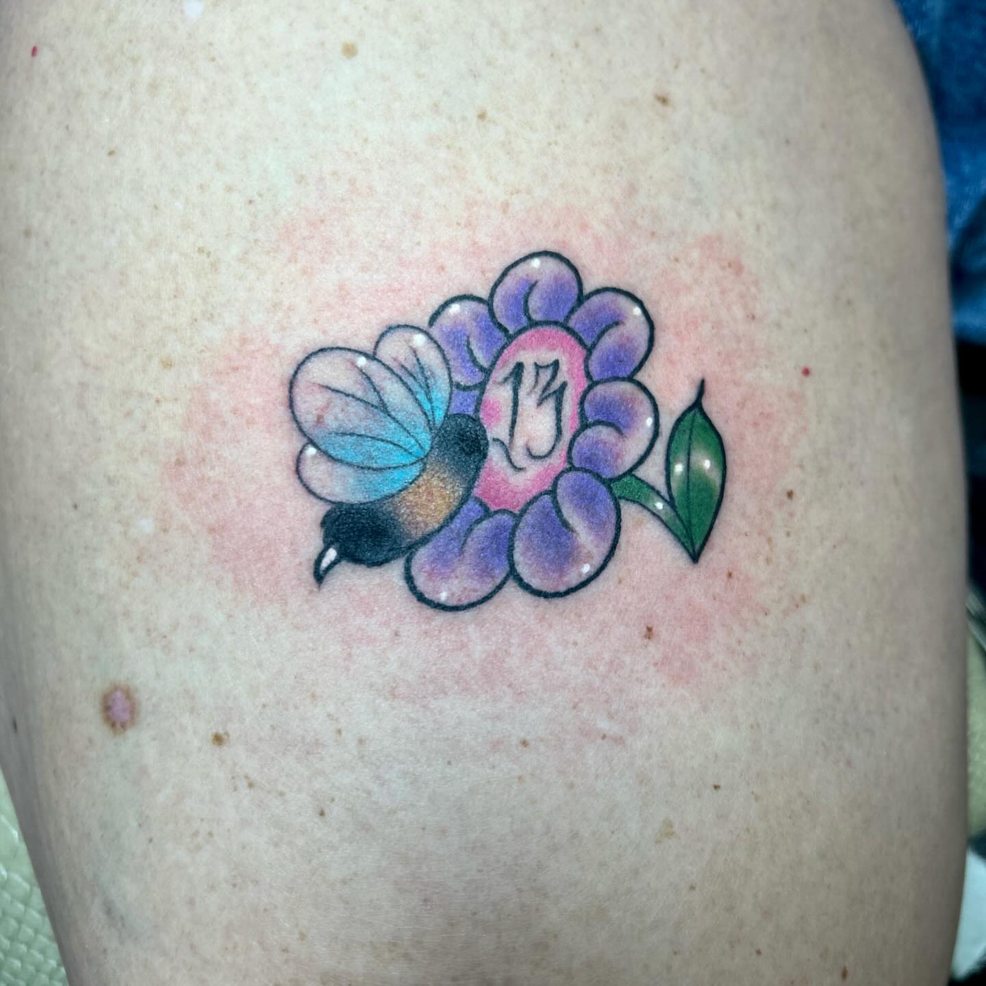 Flower and butterfly new school tattoo on the thigh by darklord_666