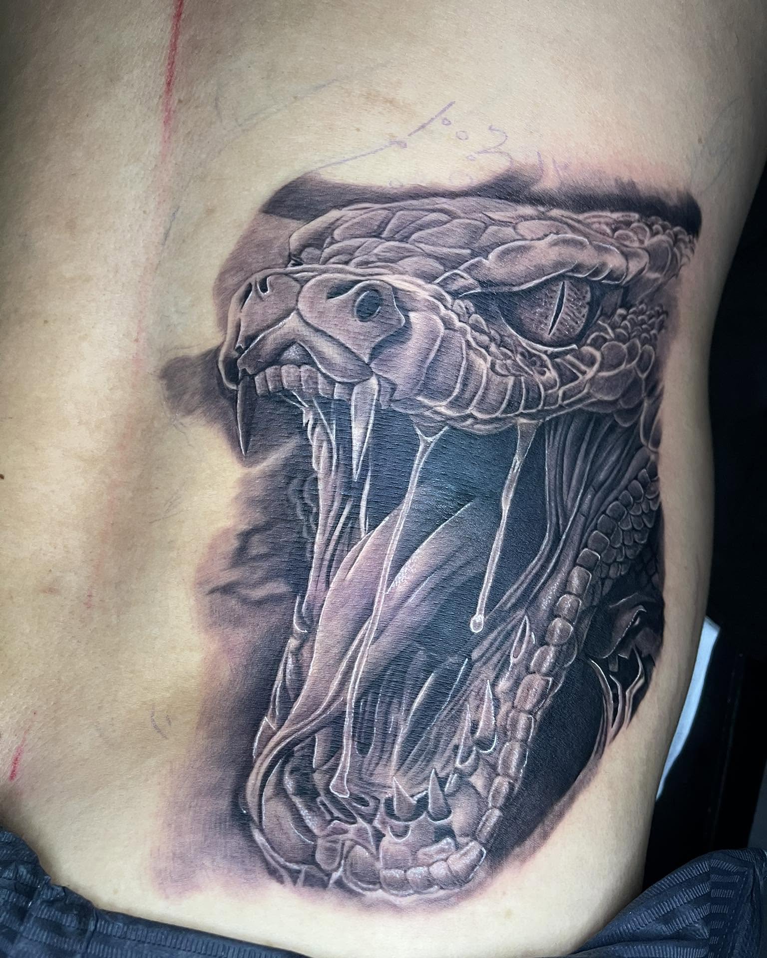 Tattoo by @saintstatts — realism, black_and_grey