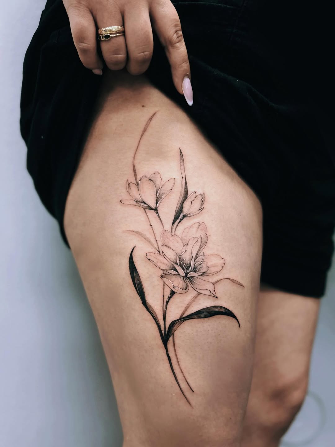 Tattoo by @angel.flow144 — fine_line, black_and_grey