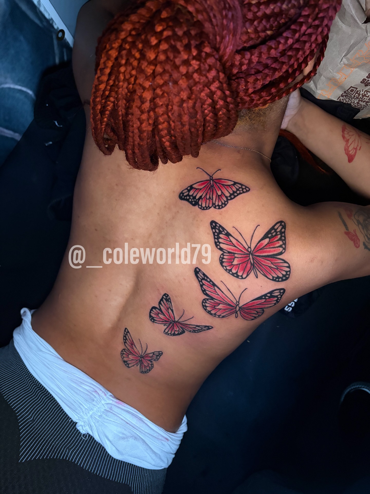 Butterflies new school tattoo on the back by Chicago tattoo artist