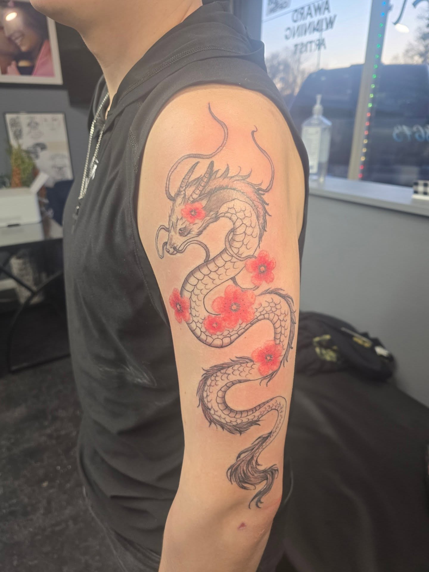 Dragon with cherry blossoms japanese irezumi tattoo on the forearm by Maddox Kitson🕷