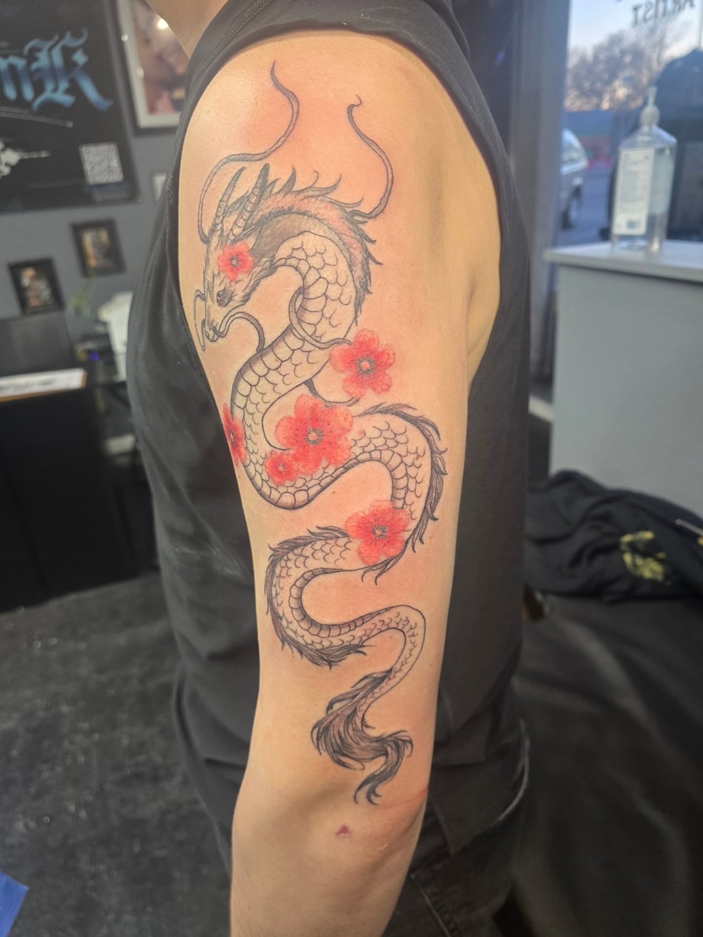 Dragon with cherry blossoms japanese irezumi tattoo on the forearm by Maddox Kitson🕷