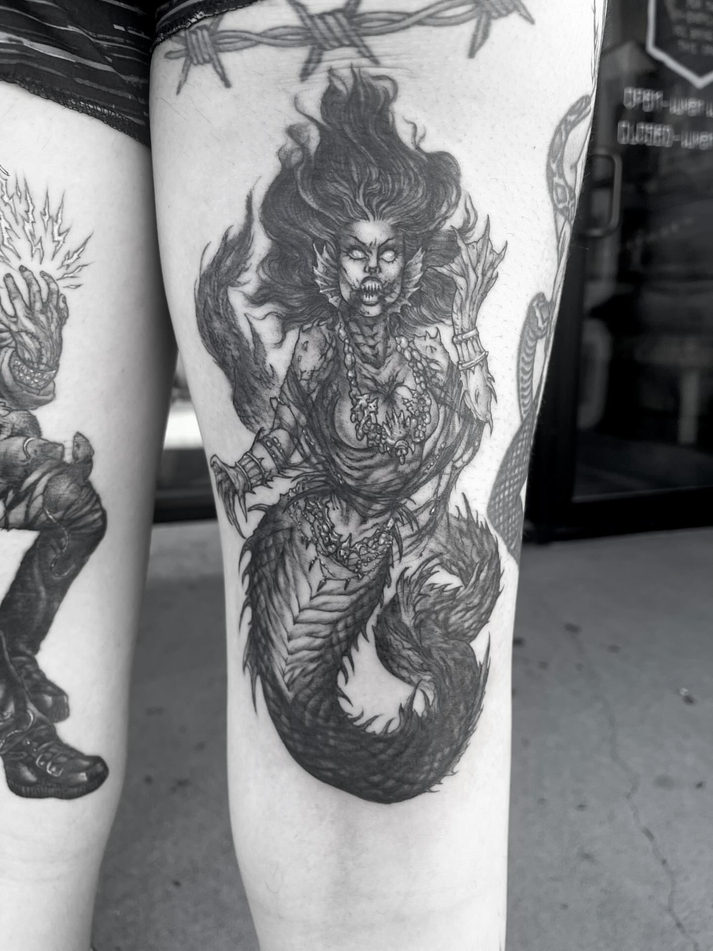 Mermaid realism tattoo on the forearm by Nathan Esteras