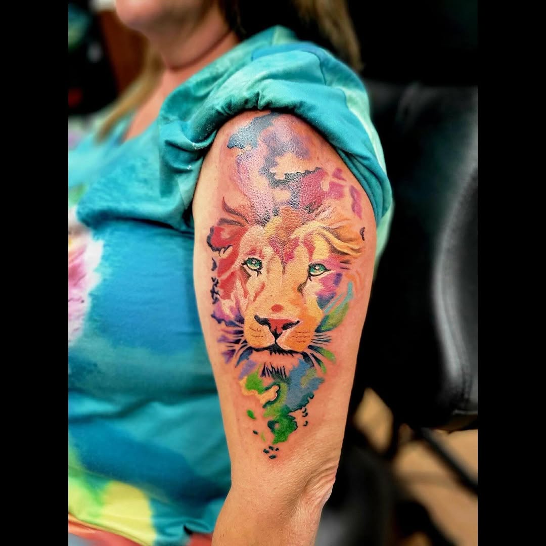 Tattoo by @tattoosbynaez — watercolor, realism