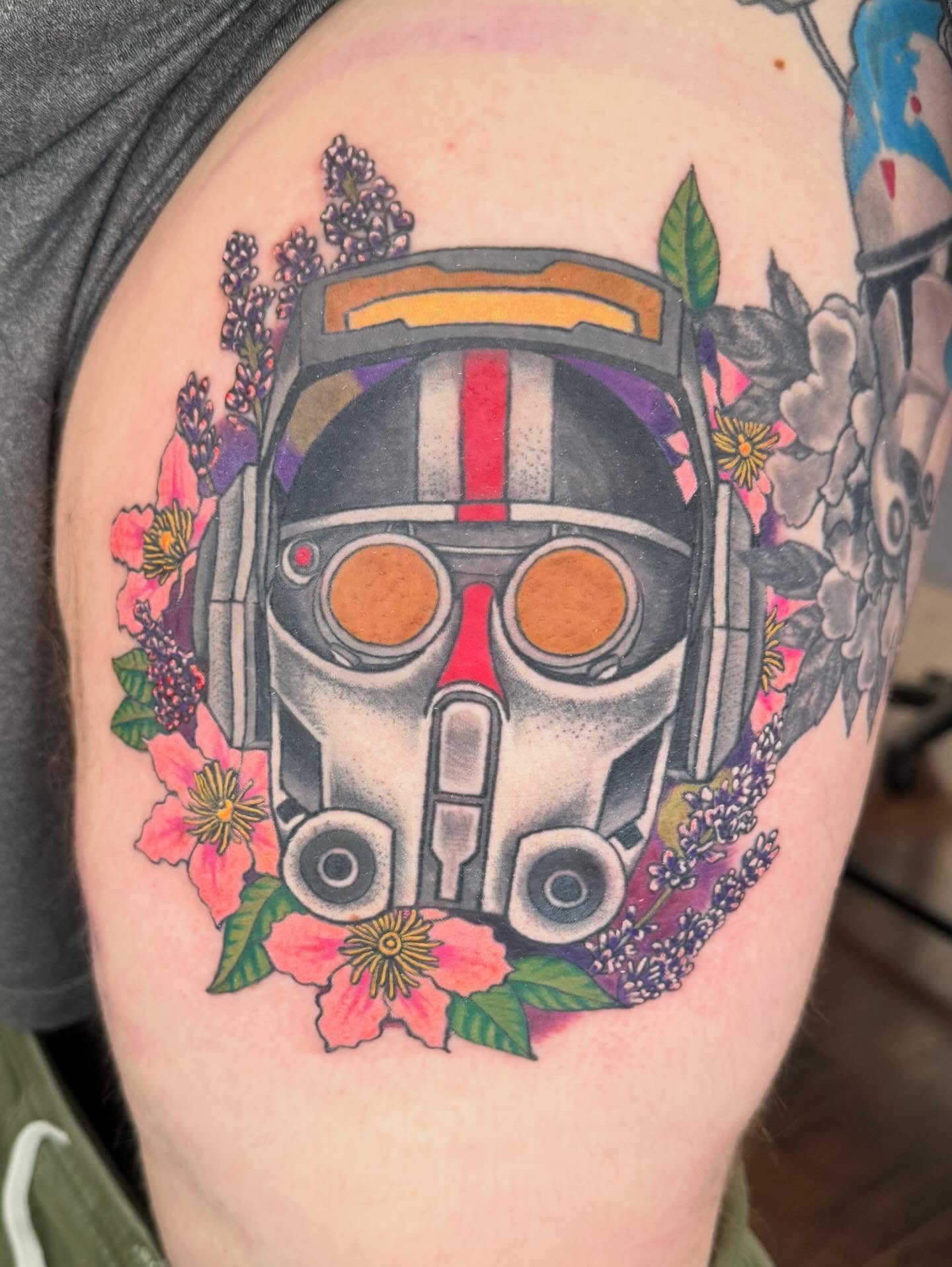 Space helmet with flowers new school tattoo on the thigh by Michael Joy