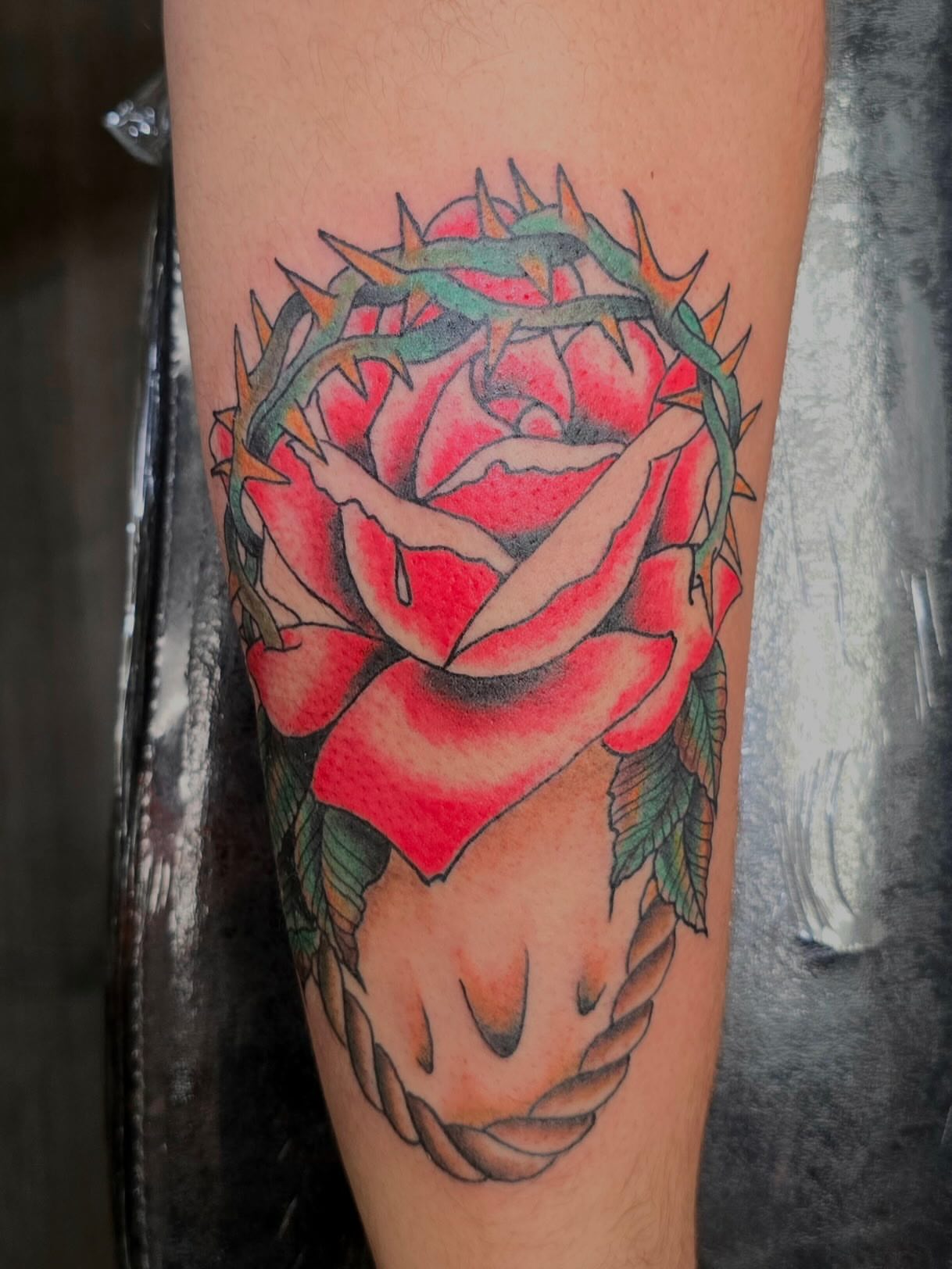 Rose and skull neo-traditional tattoo on the forearm by Columbus tattoo artist