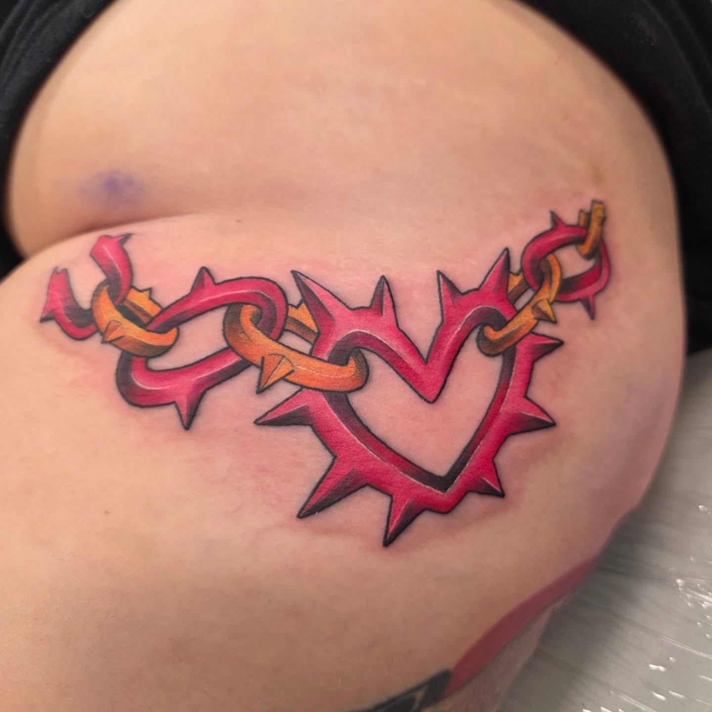 Heart with thorns and chains neo-traditional tattoo by Mandy Rizzuto