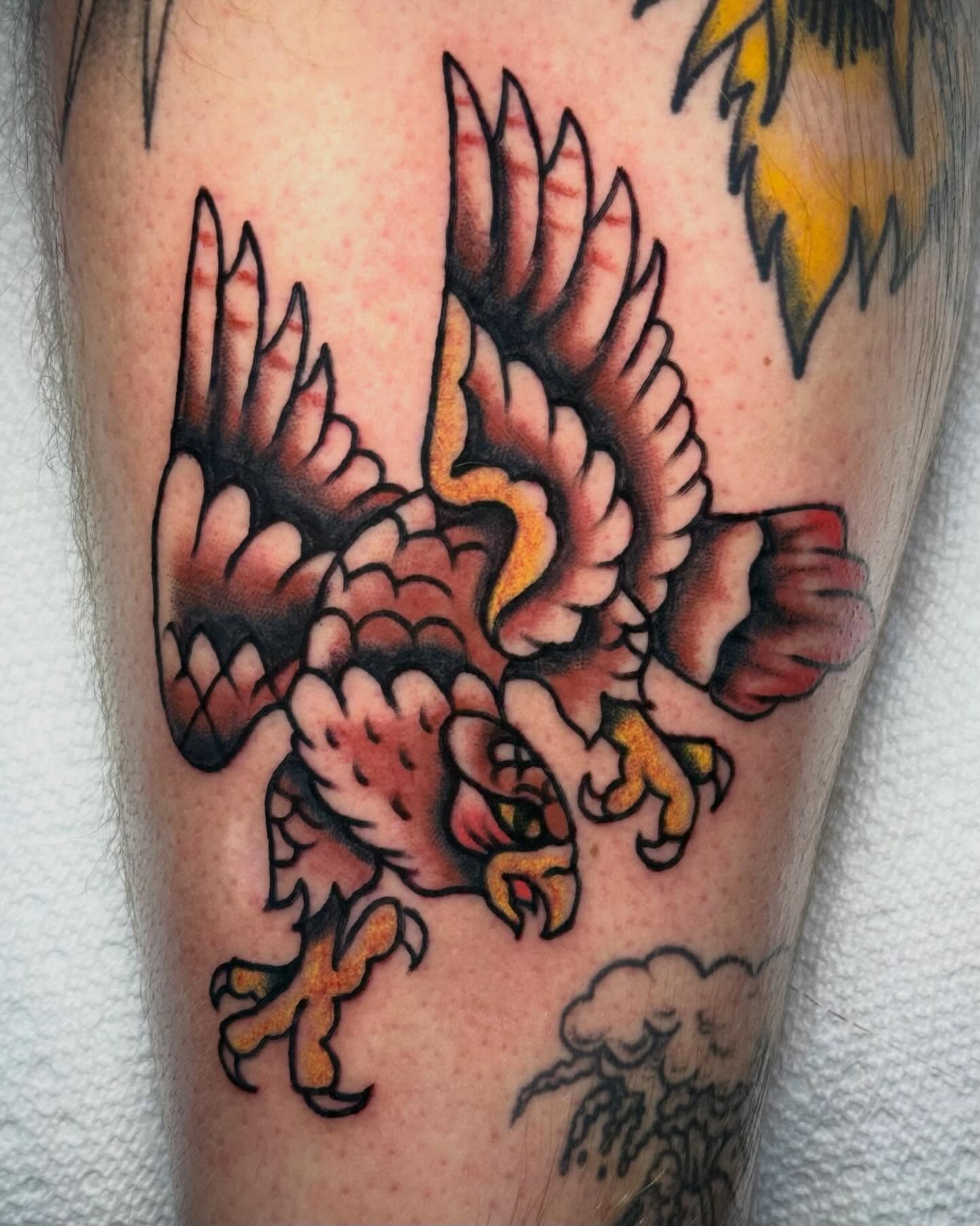 Eagle American traditional tattoo on the forearm by Ty Elias