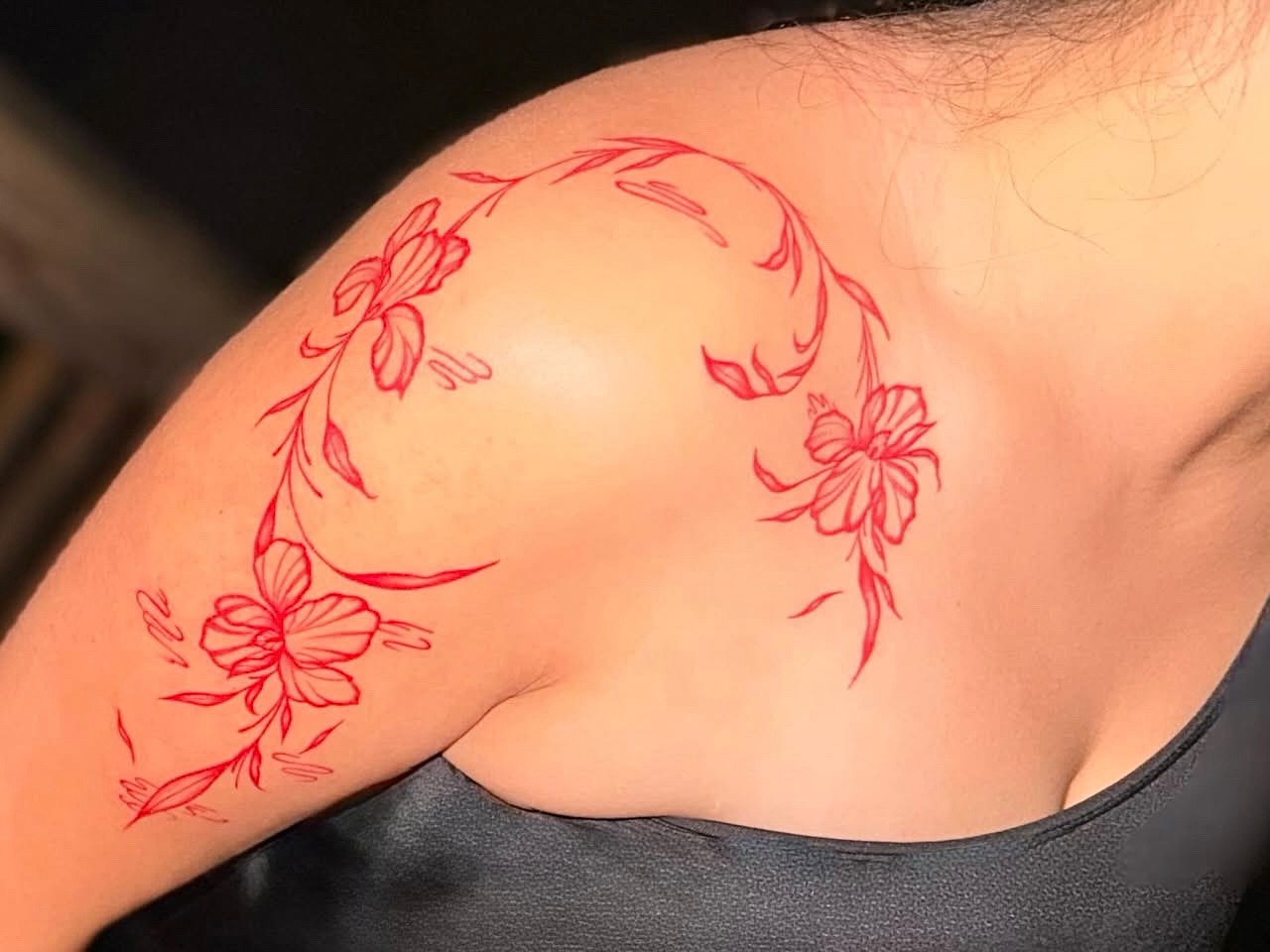 Floral design fine line tattoo on the shoulder by Emily Velletta, Huntersville, North Carolina