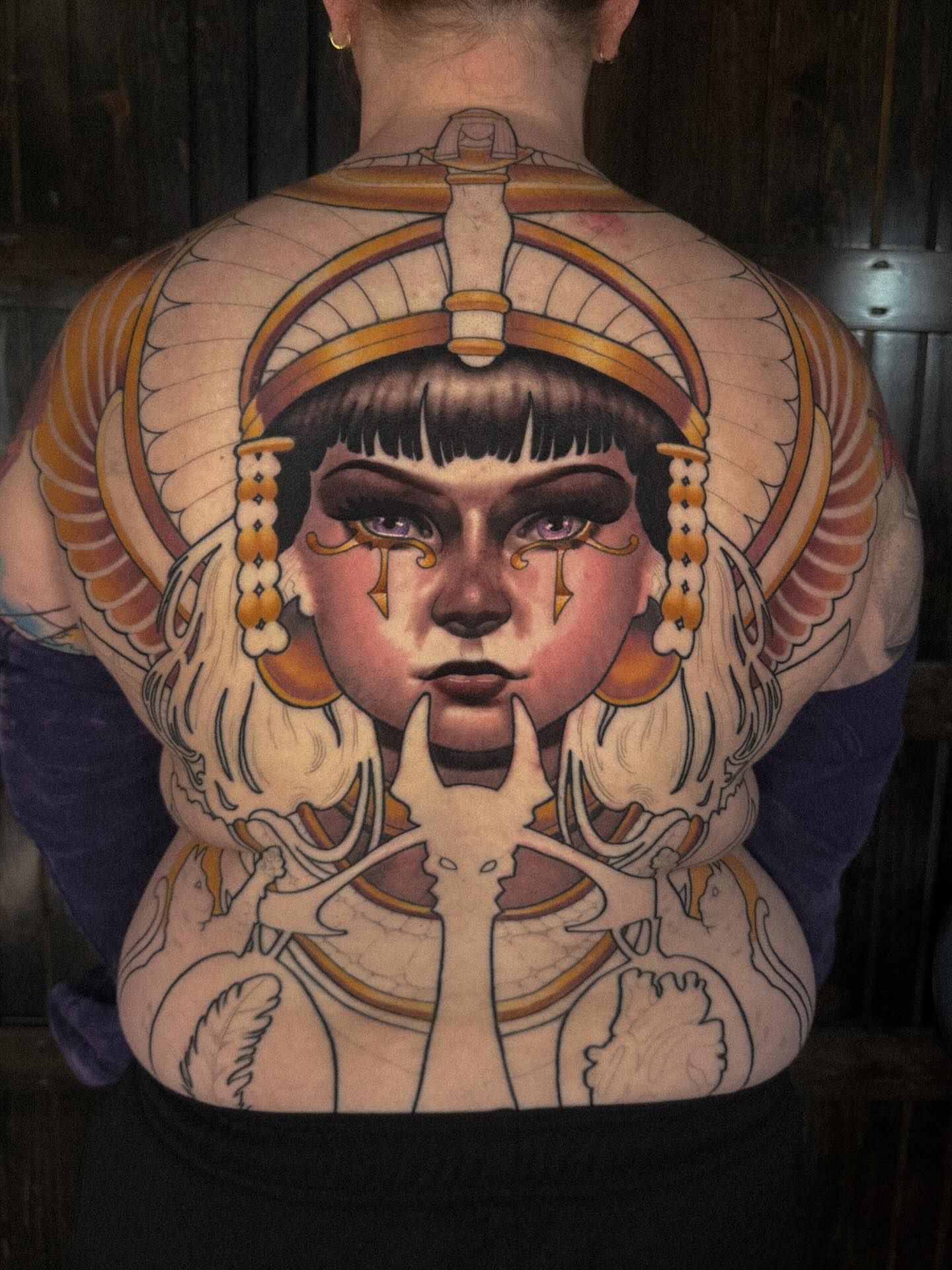 Ancient queen illustrative tattoo on the back by Nathan Thomas