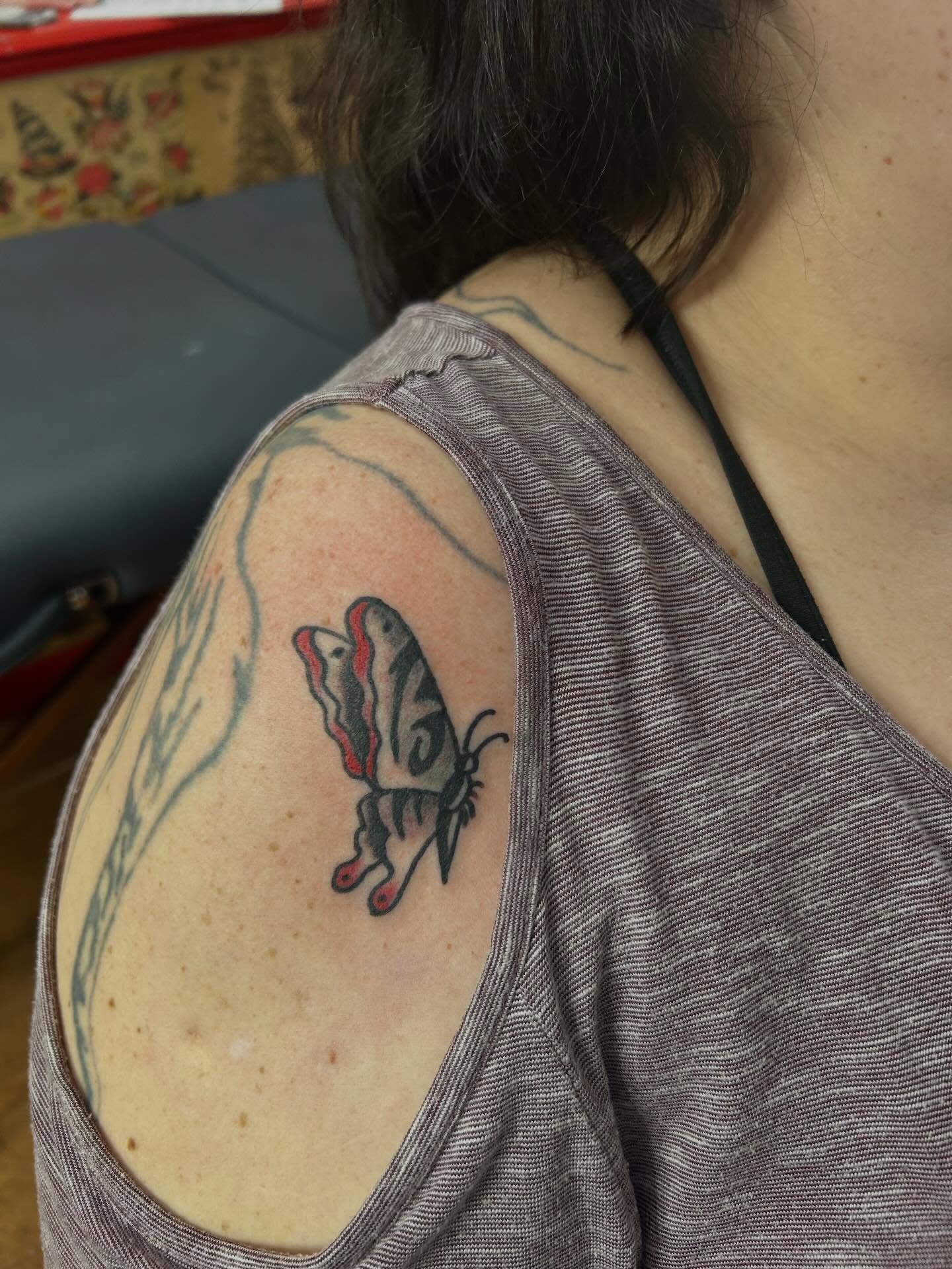 Butterfly realism tattoo on the shoulder by Elizabeth Niederkorn