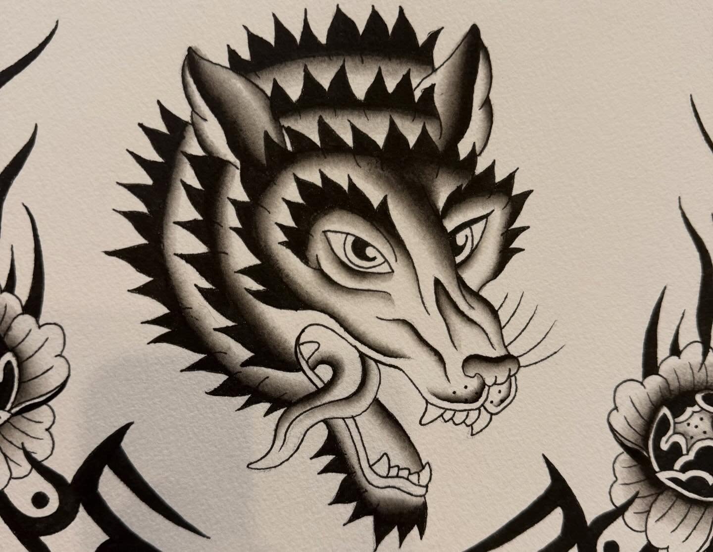 Wolf head American traditional tattoo by savannah