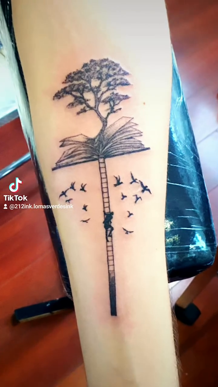 Tree growing from a book sketch tattoo on the forearm by Tatuajes Betto Ink Tattoo