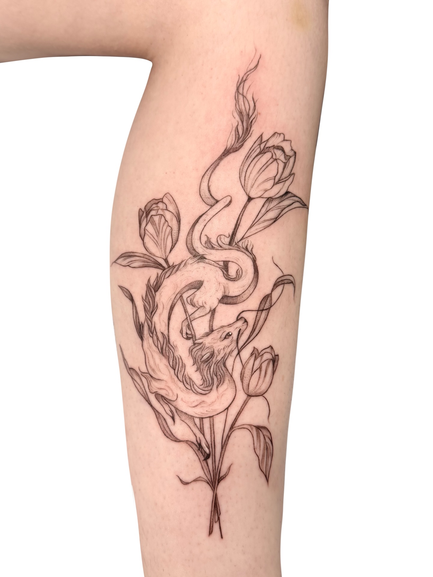 Snake and flowers realism tattoo on the forearm by Fionna, Seattle, Washington
