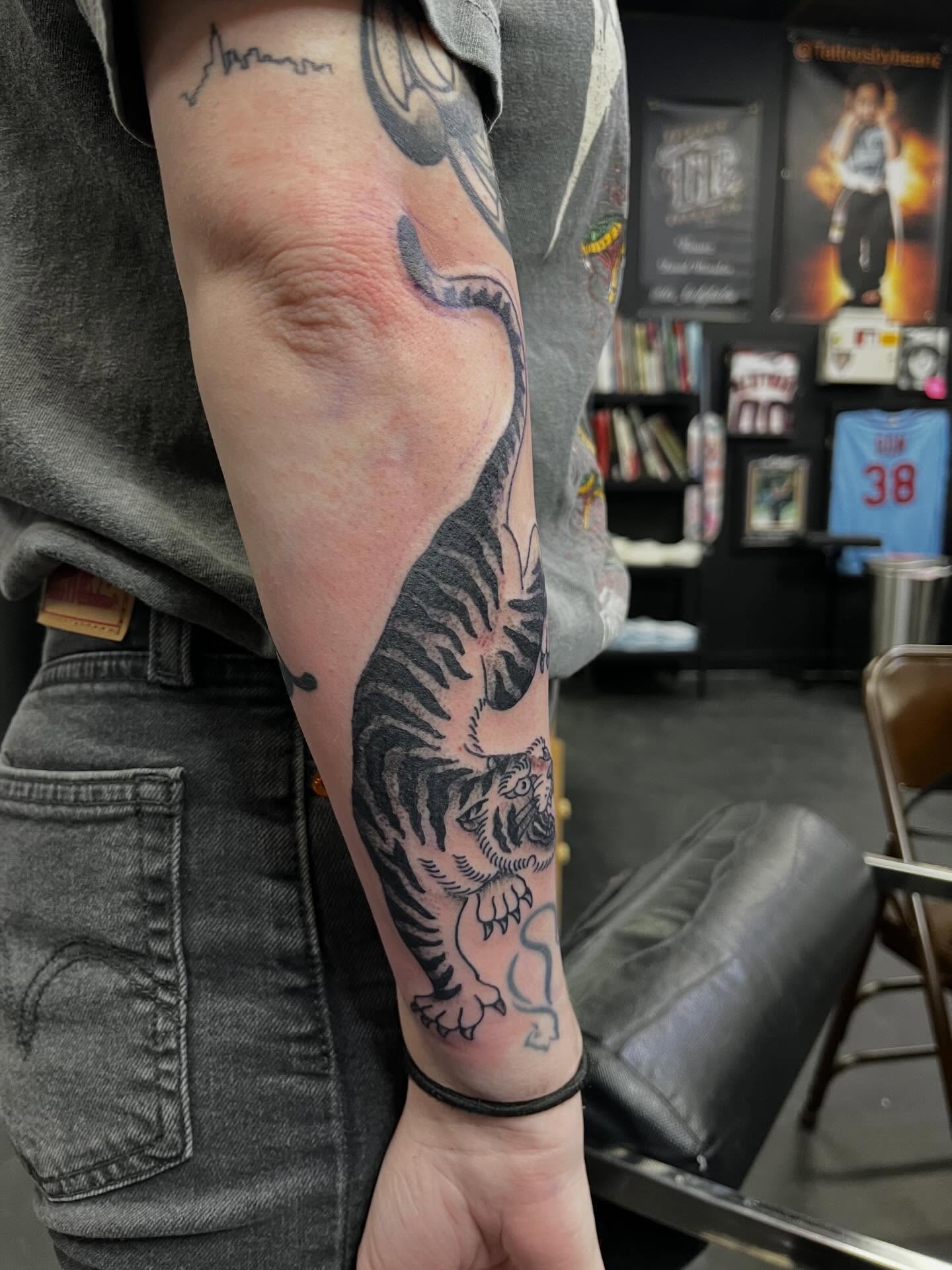 Tiger American traditional tattoo on the forearm by CRAIG B⛓️ Cincinnati Tattoo Artist