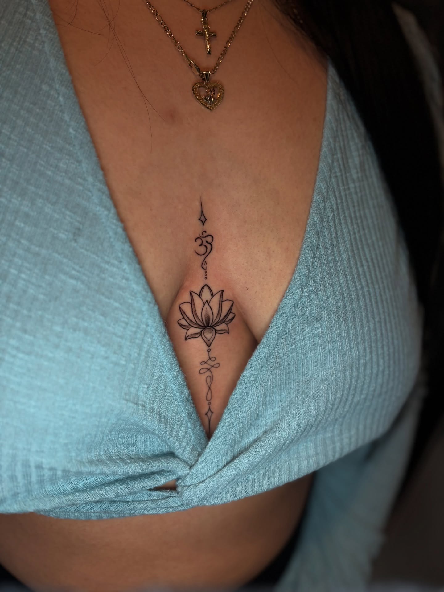 Lotus flower geometric tattoo on the chest by @_frankyvee