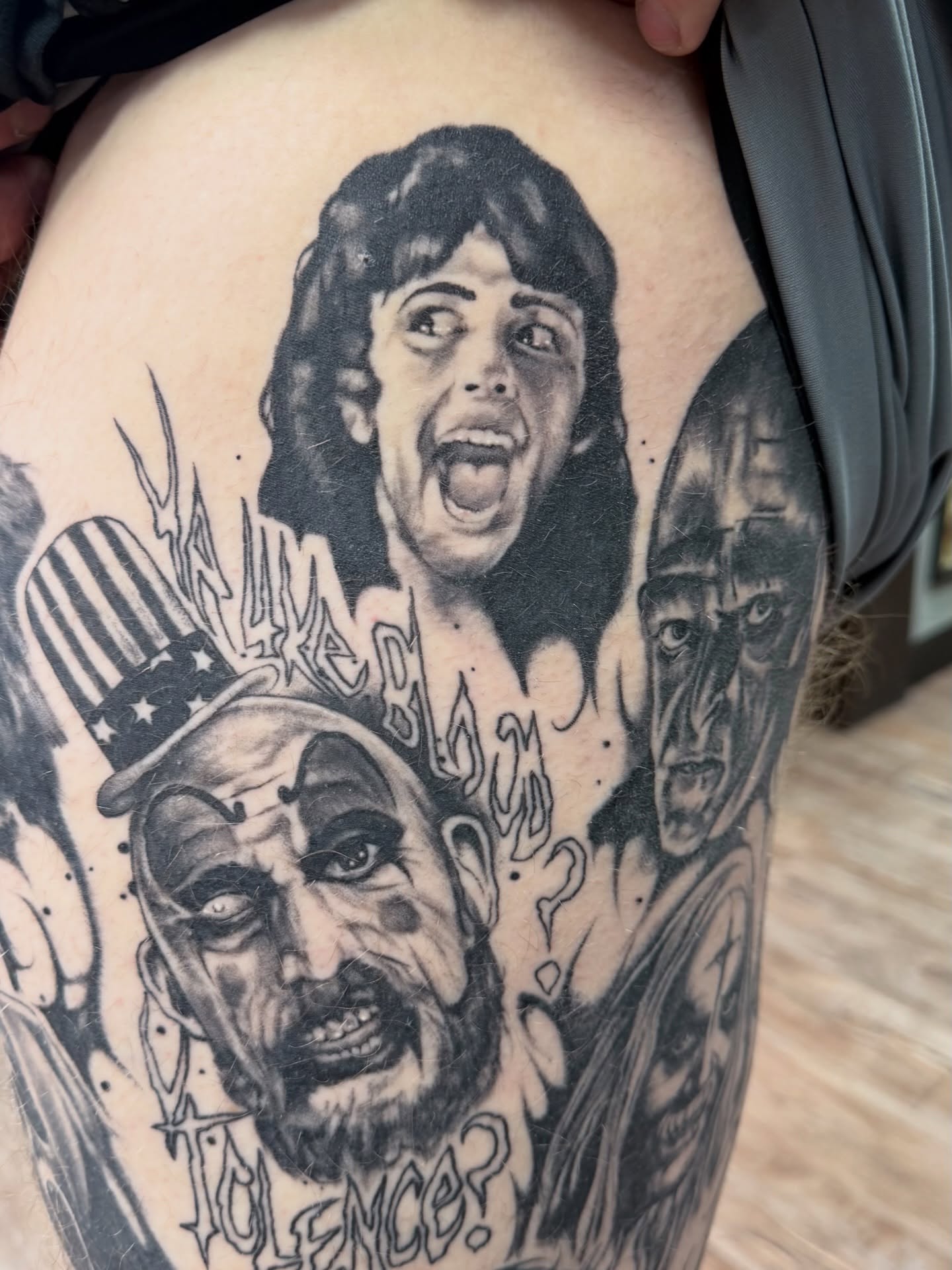 Zombie horror characters realism tattoo on the thigh by Josh Kronauer