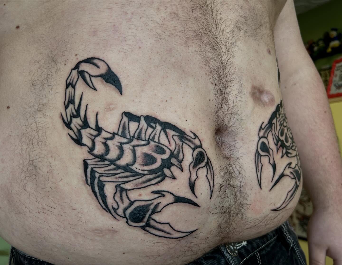 Scorpion black and grey tattoo on the chest by Bria🩸