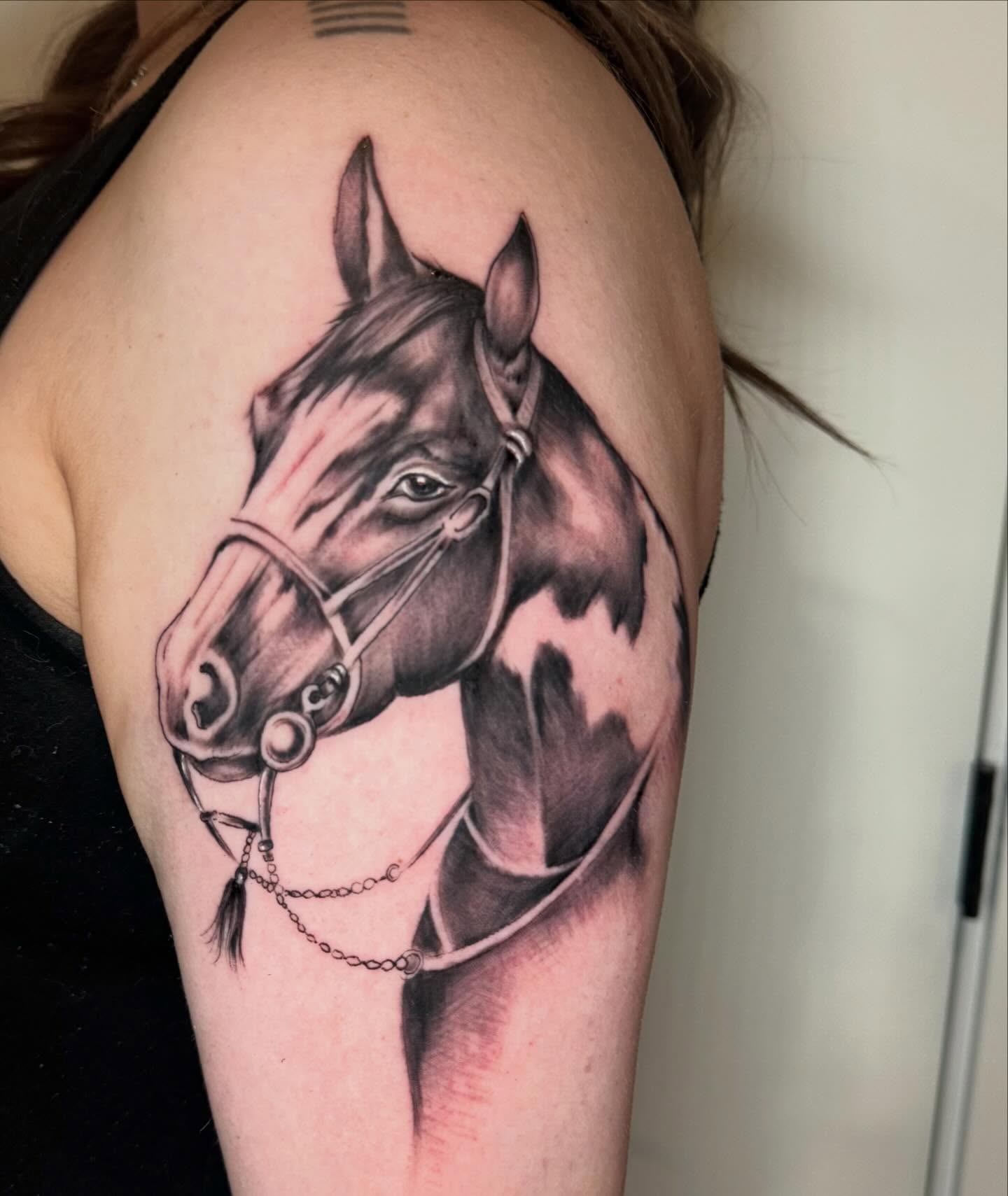 Horse head realism tattoo on the shoulder by Matthew Crawley