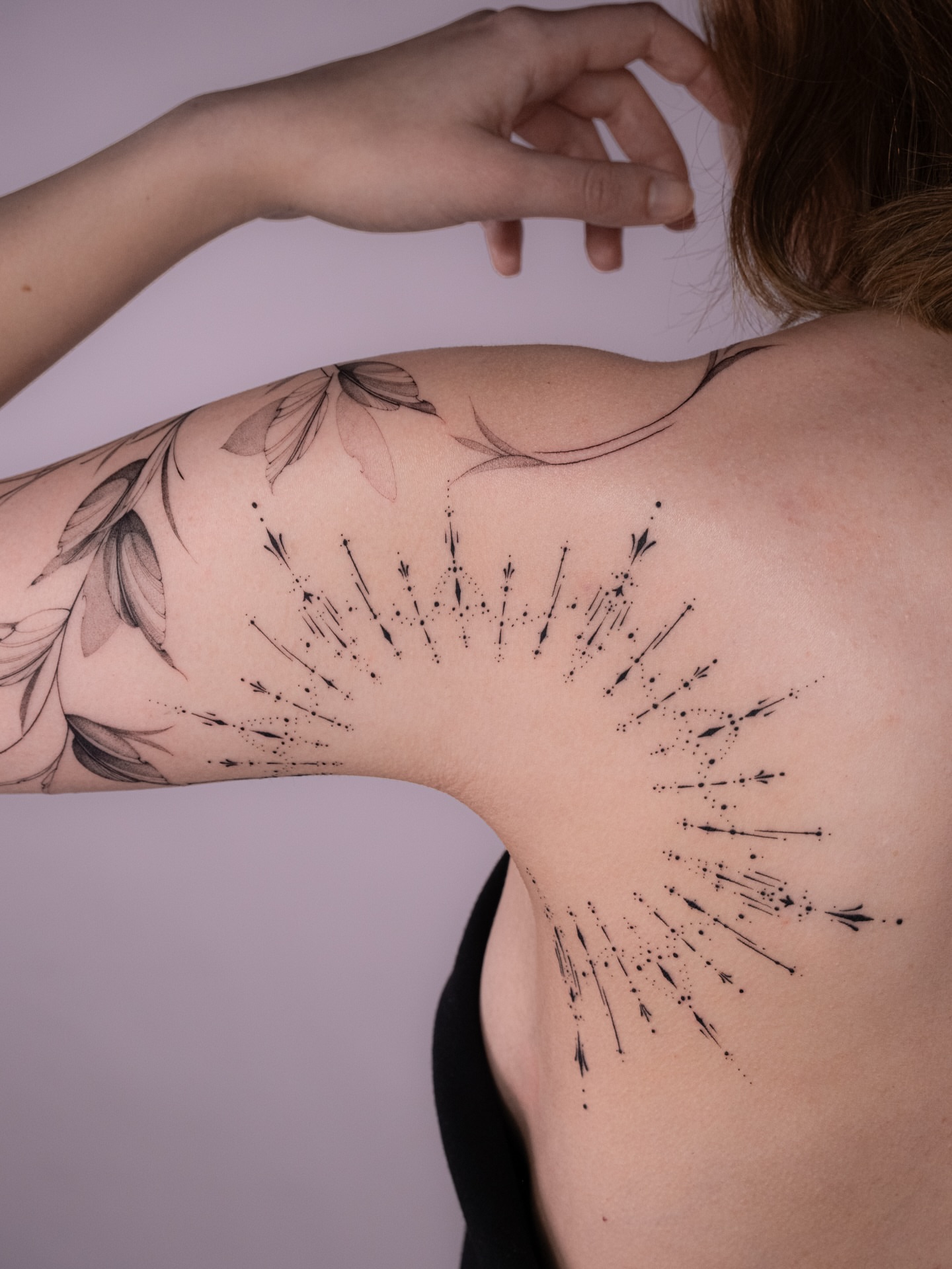 Abstract burst dotwork tattoo on the shoulder by i flower you