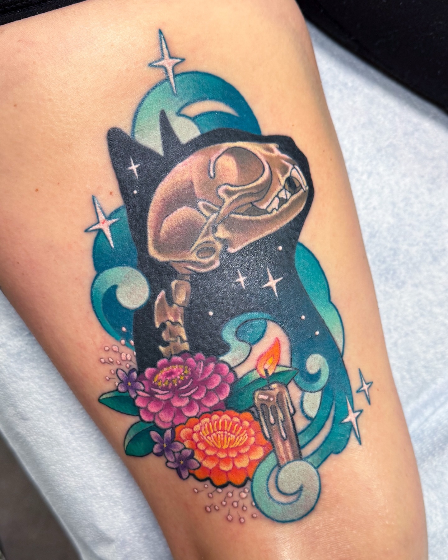 Skull and flowers new school tattoo on the thigh by Janine Ramos