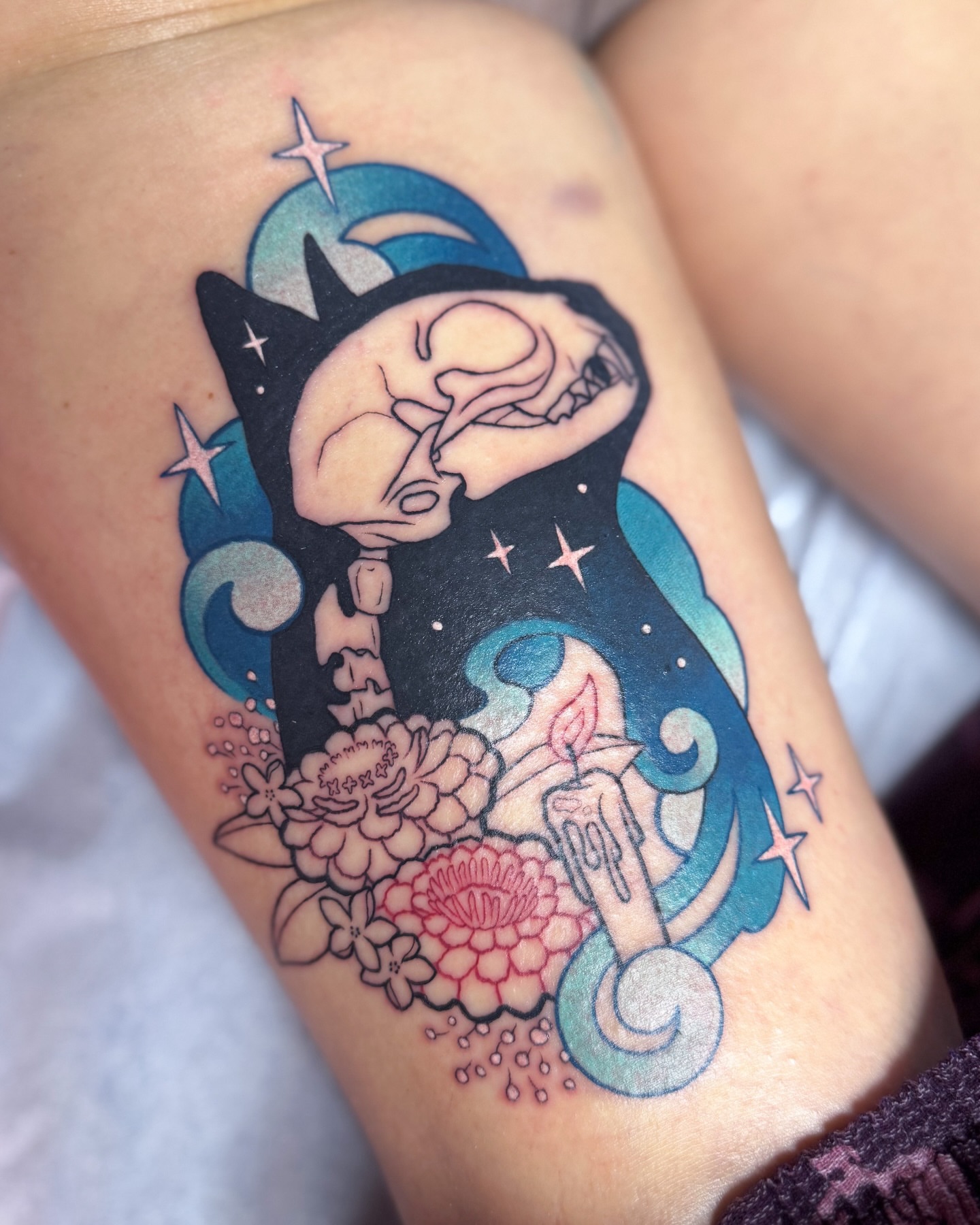 Cat skull with flowers new school tattoo on the thigh by Janine Ramos