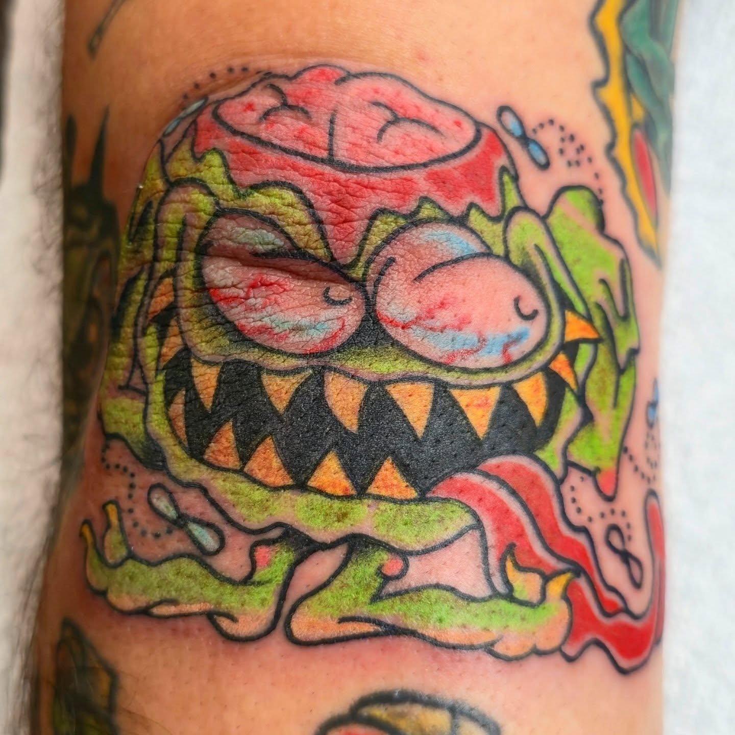 Monster American traditional tattoo on the forearm by Tattoo Artist, Orange, California
