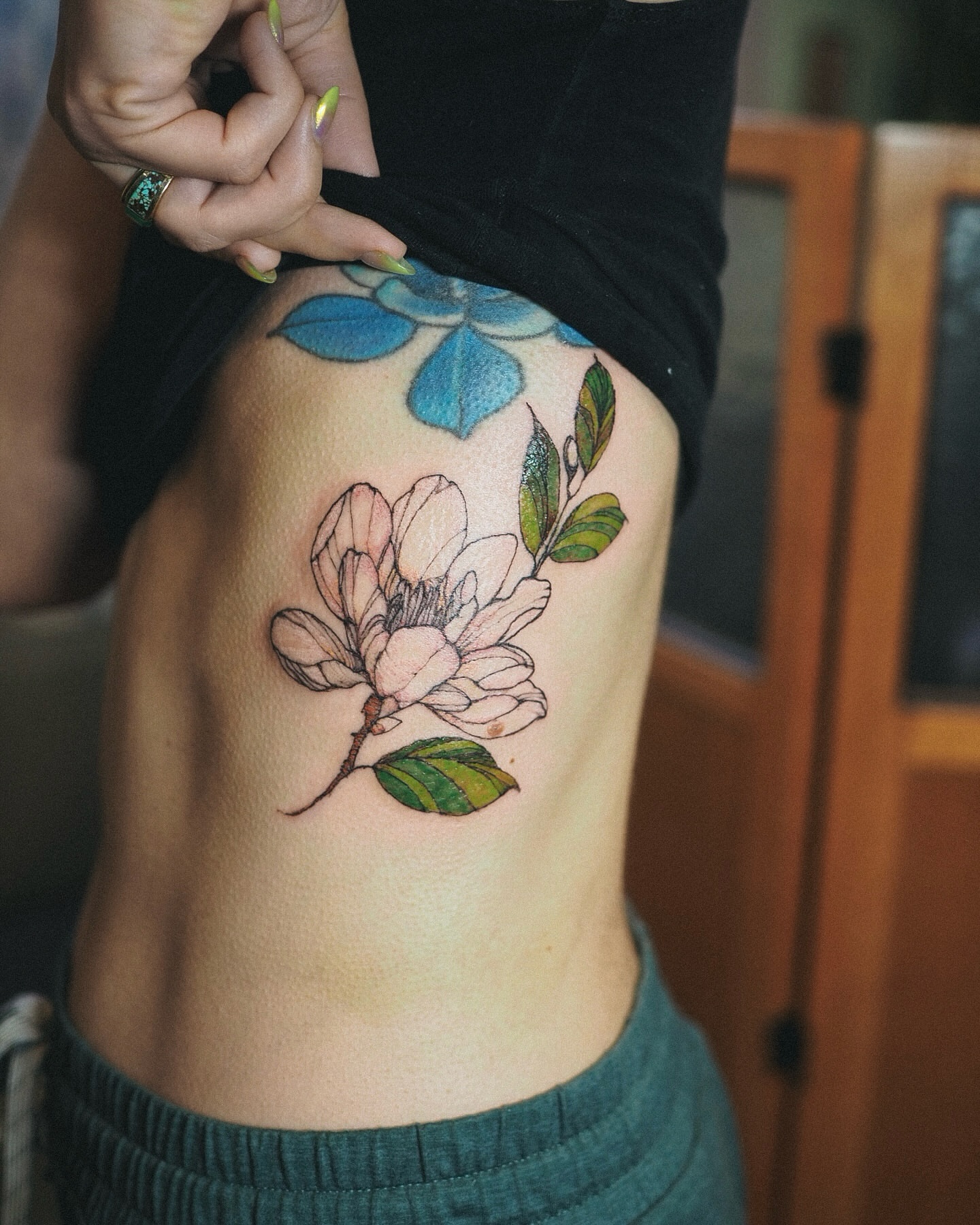 Flower realism tattoo on the thigh by Inks by Nastia