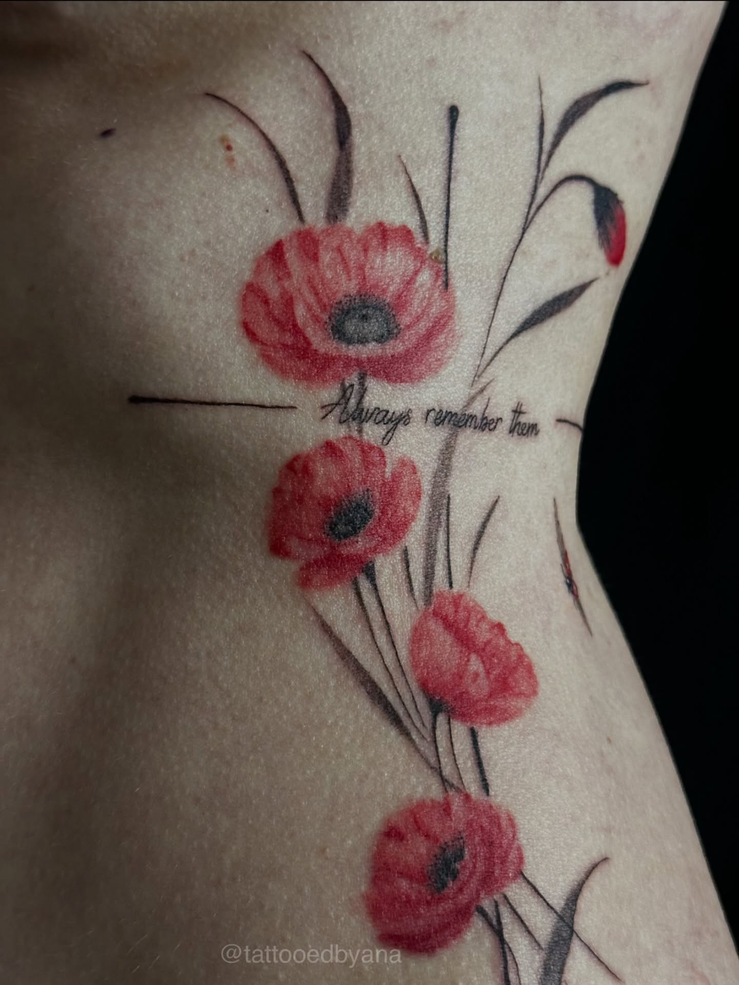 Red poppies realism tattoo on the ribs by Tattoo artist Denver