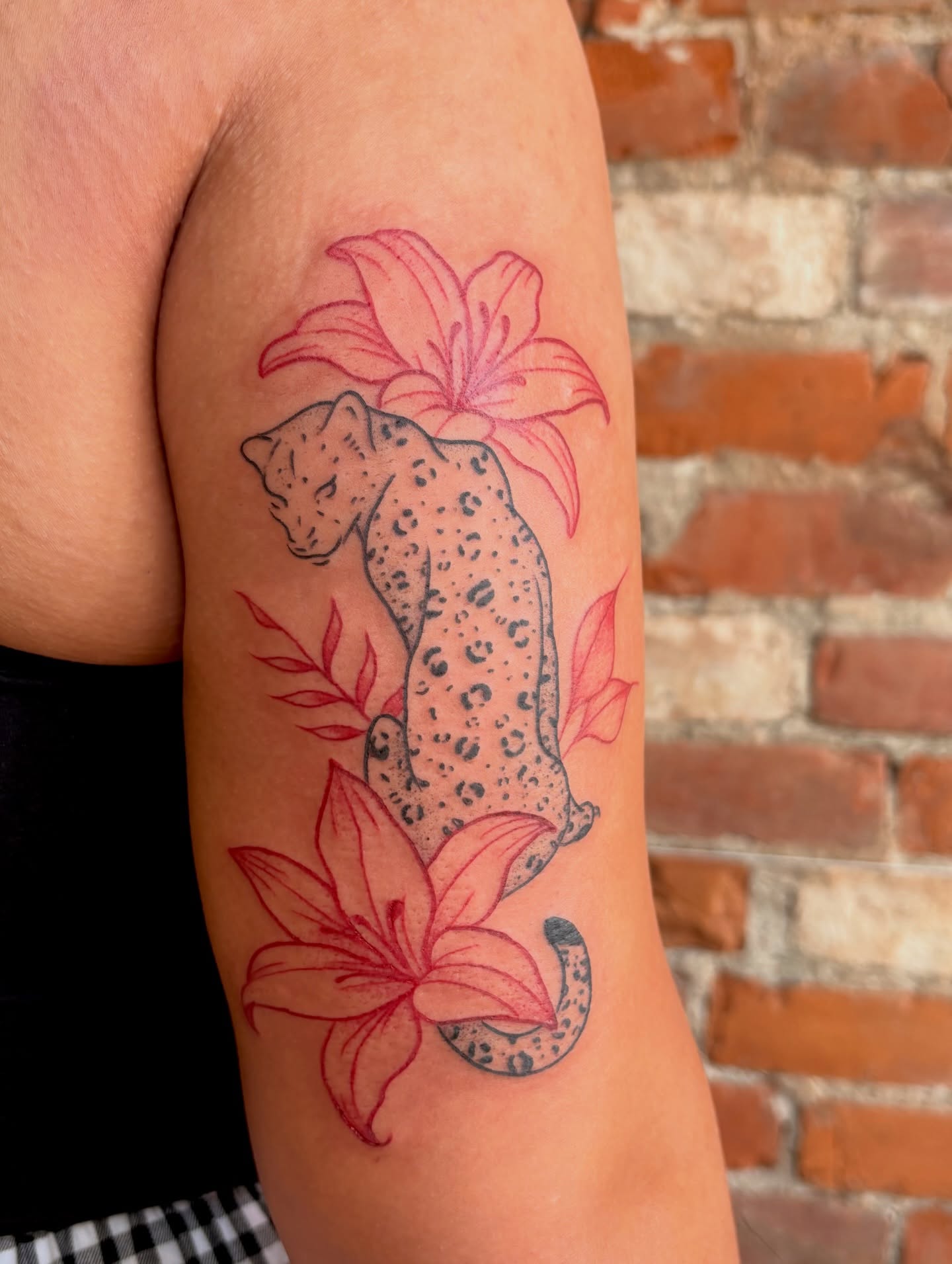 Leopard and lilies dotwork tattoo on the forearm by Jen Osborne ♡ Cincinnati Tattoo Artist