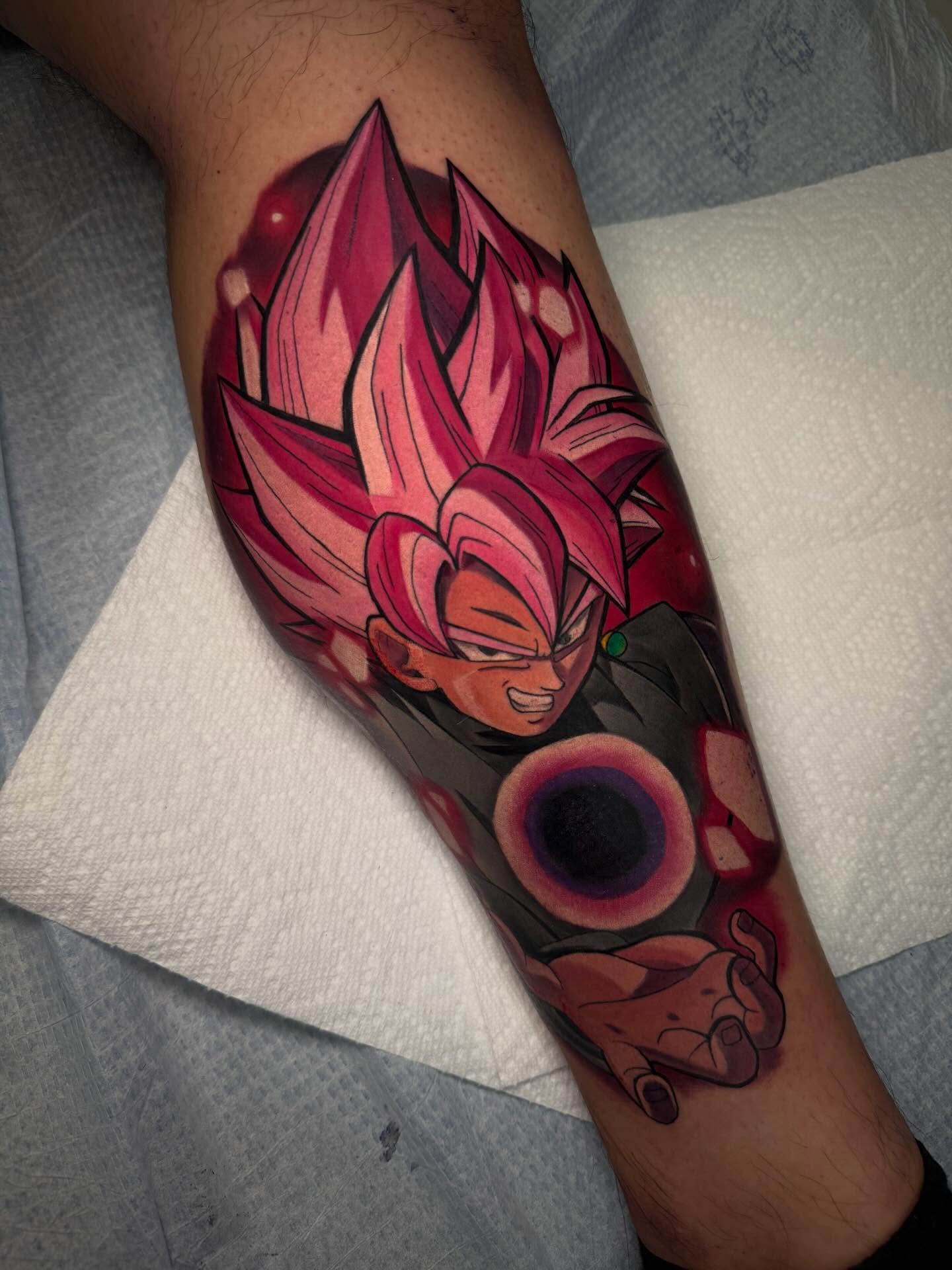 Super saiyan god anime tattoo on the forearm by Kenneth Ruiz
