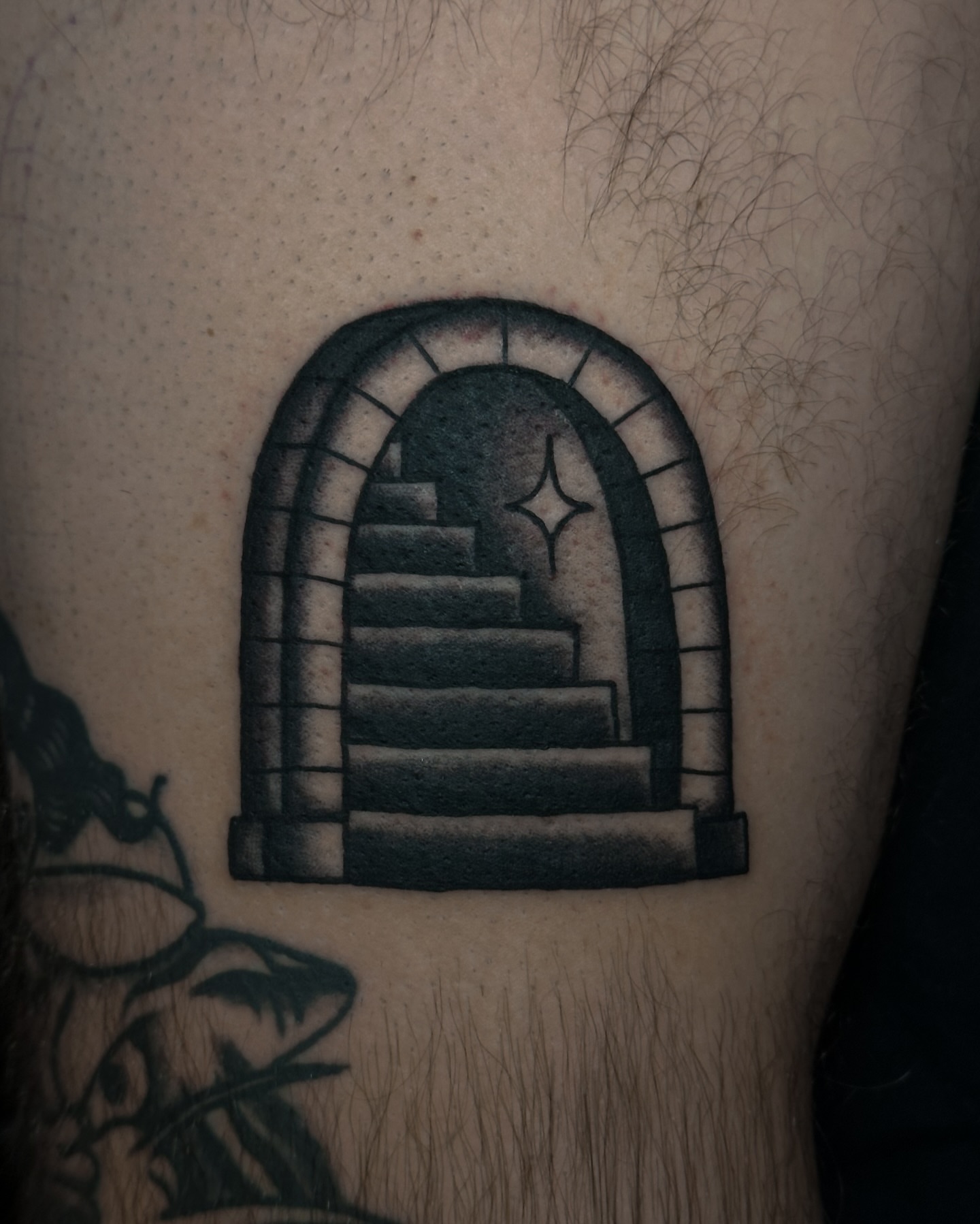 Staircase black and grey tattoo on the forearm by Victoria