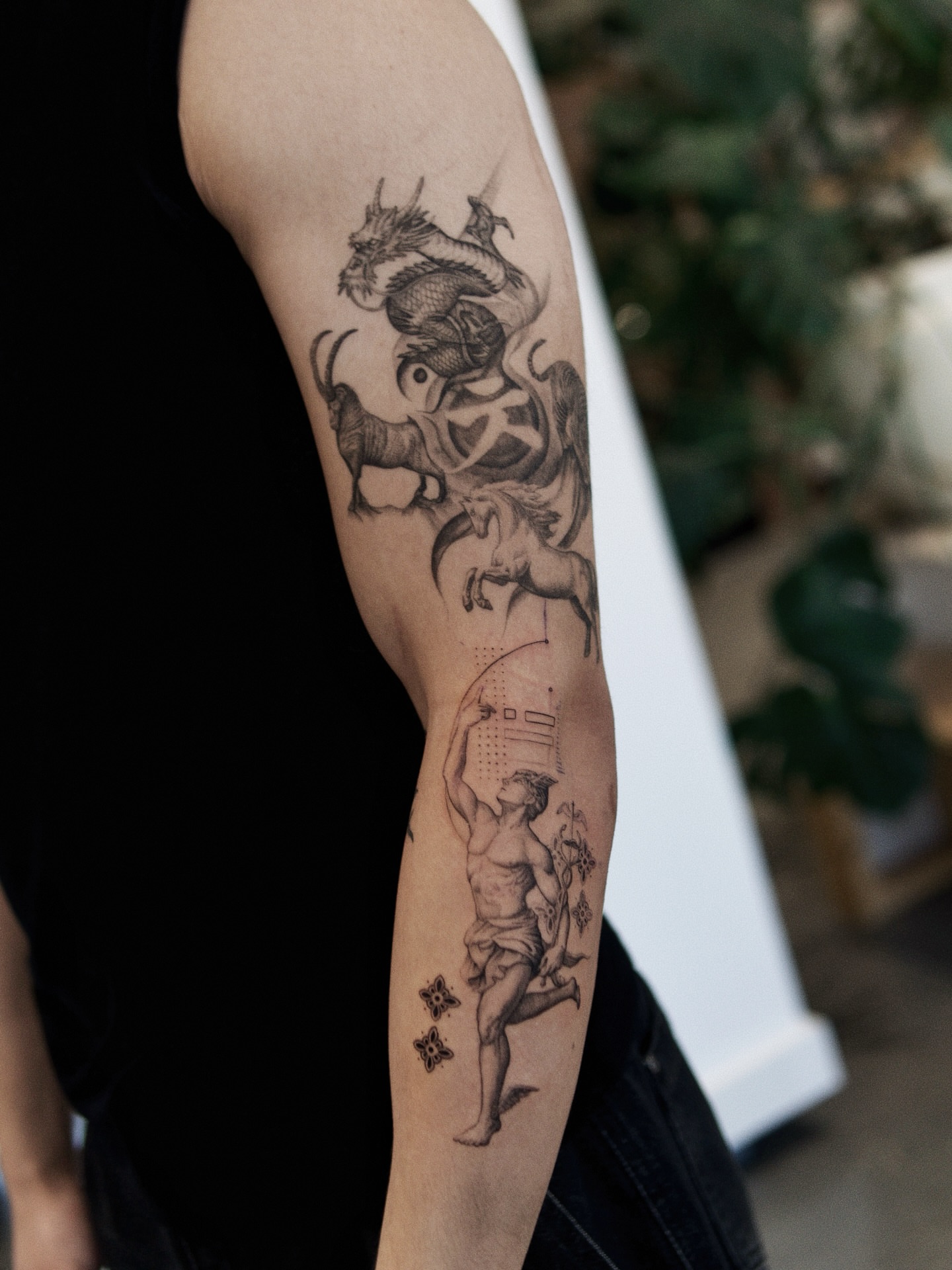 Mythical creature and rider dotwork tattoo on the forearm by Ray Quinday